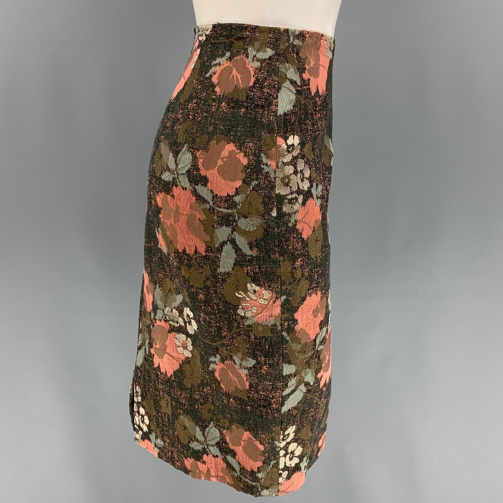 DRIES VAN NOTEN skirt comes in multi-color woven floral cotton blend with a slip liner featuring a pencil style and a back zip up closure.
Very Good
Pre-Owned Condition. 

Marked:   38 

Measurements: 
  Waist: 28 inches  Hip: 35 inches  Length: