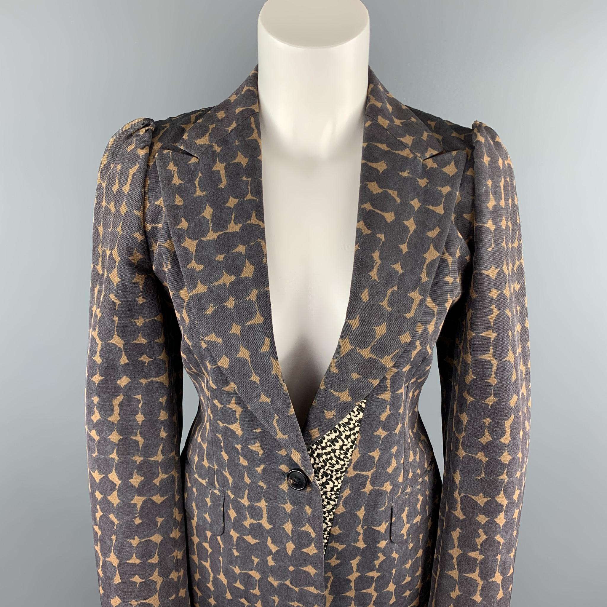 DRIES VAN NOTEN blazer comes in a dark gray & tan print cotton & rayon with a full brown liner featuring a peak lapel, flap pockets, and a single button closure.

Excellent Pre-Owned Condition.
Marked: 38

Measurements:

Shoulder: 15 in. 
Chest: 34