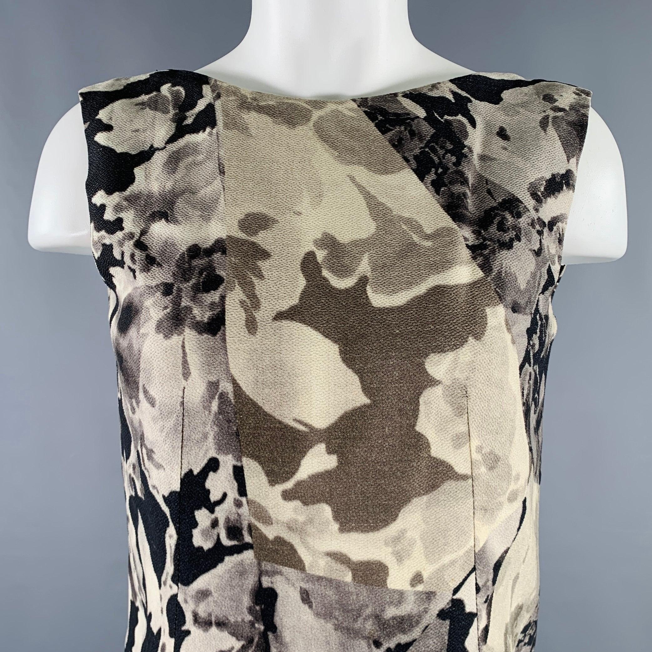 DRIES VAN NOTEN dress
in a grey and olive green wool silk blend fabric featuring a marbled pattern, sleeveless style, and open back. Made in Belgium.Very Good Pre-Owned Condition. Minor mark. 

Marked:   38 

Measurements: 
 
Shoulder: 13 inches