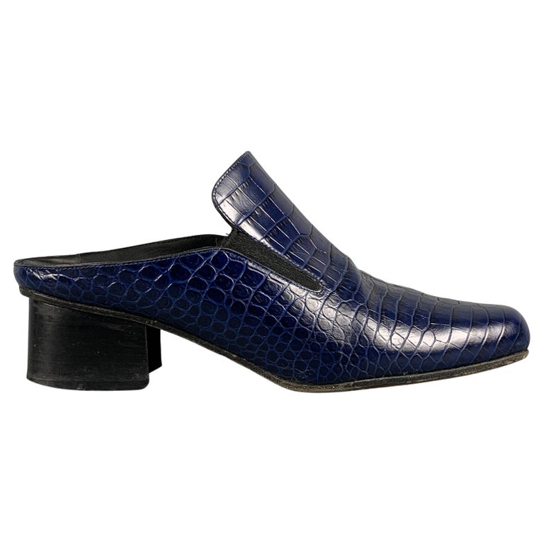 DRIES VAN NOTEN Size 7.5 Navy Embossed Leather Slip On Boots For Sale at  1stDibs