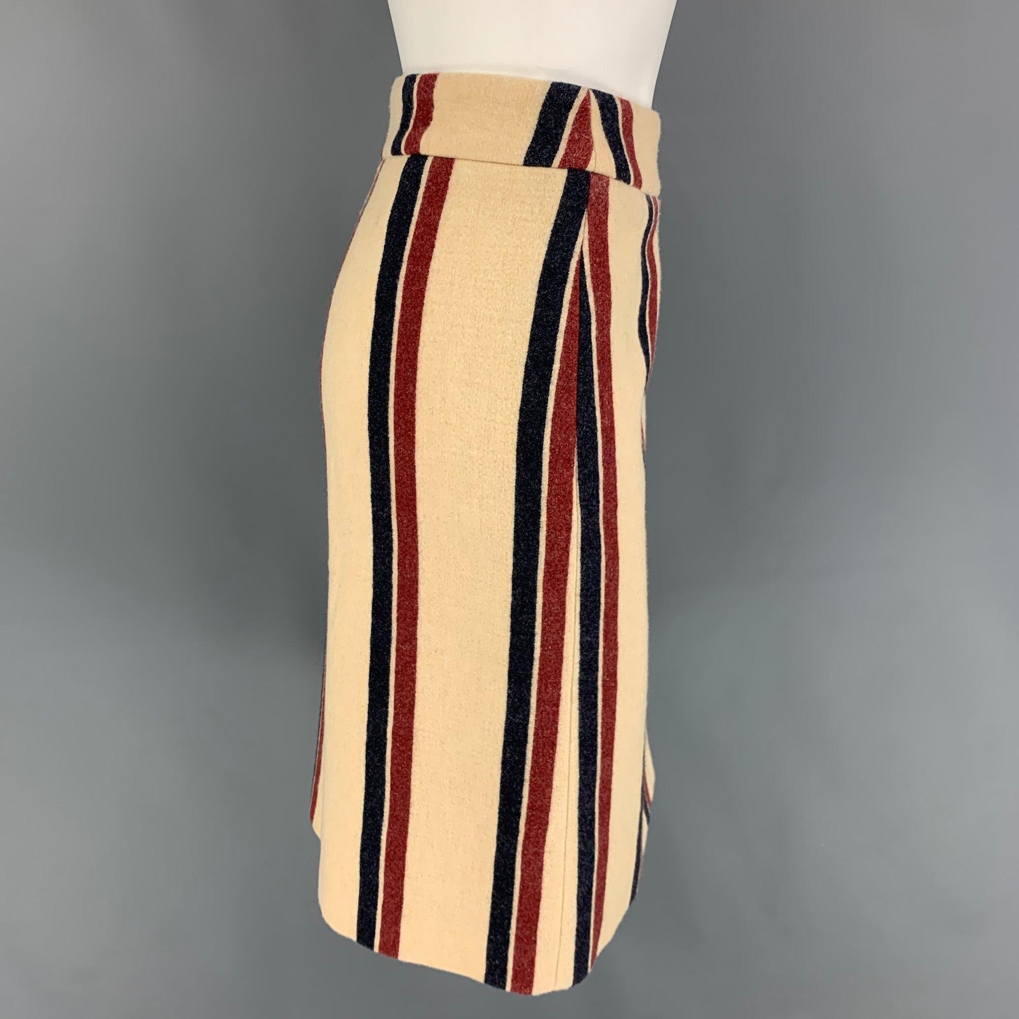 DRIES VAN NOTEN skirt comes in a cream & red stripe wool / polyamide featuring a pencil style and a back zip up closure.
Very Good
Pre-Owned Condition. 

Marked:   40 

Measurements: 
  Waist: 34 inches  Hip: 40 inches  Length: 23 inches 
  
  
