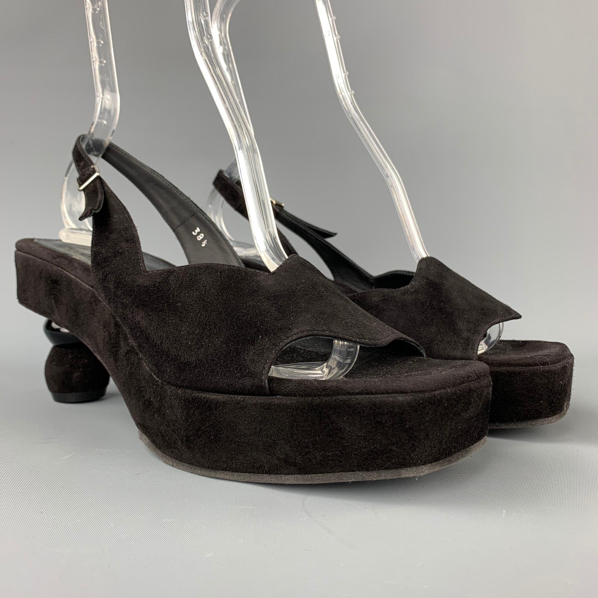 DRIES VAN NOTEN sandals comes in a black velvet featuring a platform style, chunky circle heel, and a slingback closure. Made in Italy.

Very Good Pre-Owned Condition.
Marked: EU 38.5

Measurements:

Platform: 1 in.
Heel: 2 in.