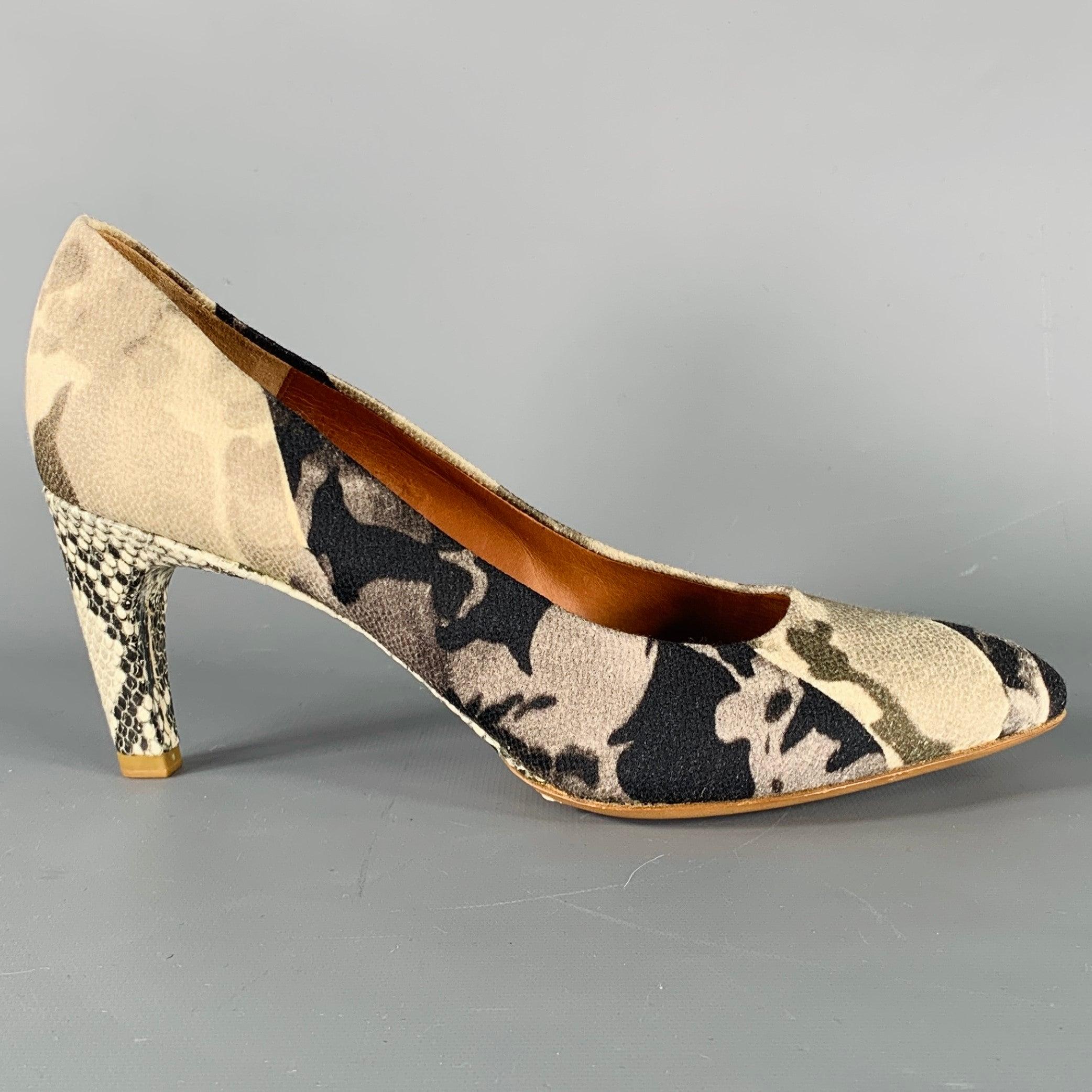 DRIES VAN NOTEN Pumps
aus grauem und schwarzem Stoff, mit klassischem Stil, marmoriertem Design und Details aus Schlangenleder an der Unterseite und am Absatz. Made in Italy.Neu ohne Box. 

Markiert:   10643 38.5 

Abmessungen: 
  Absatz: 2,75 Zoll 
