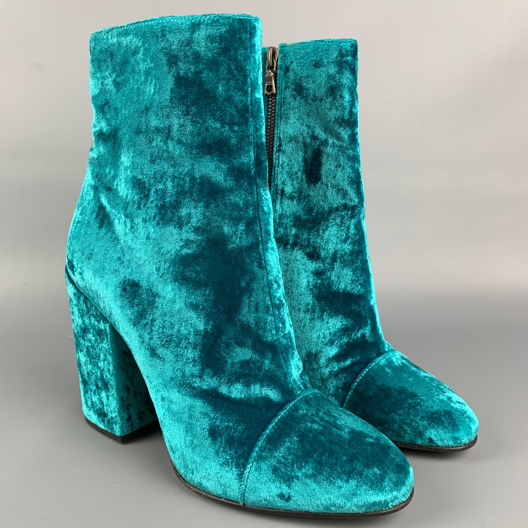 DRIES VAN NOTEN ankle boots comes in a turquoise velvet featuring a side zipper and a chunky heel. Made in Italy. 

New Without Tags. 
Marked: 17706 38.5

Measurements:

Length: 8.5 in.
Width: 3 in.
Height: 5.5 in.
Heel: 4 in. 

SKU: