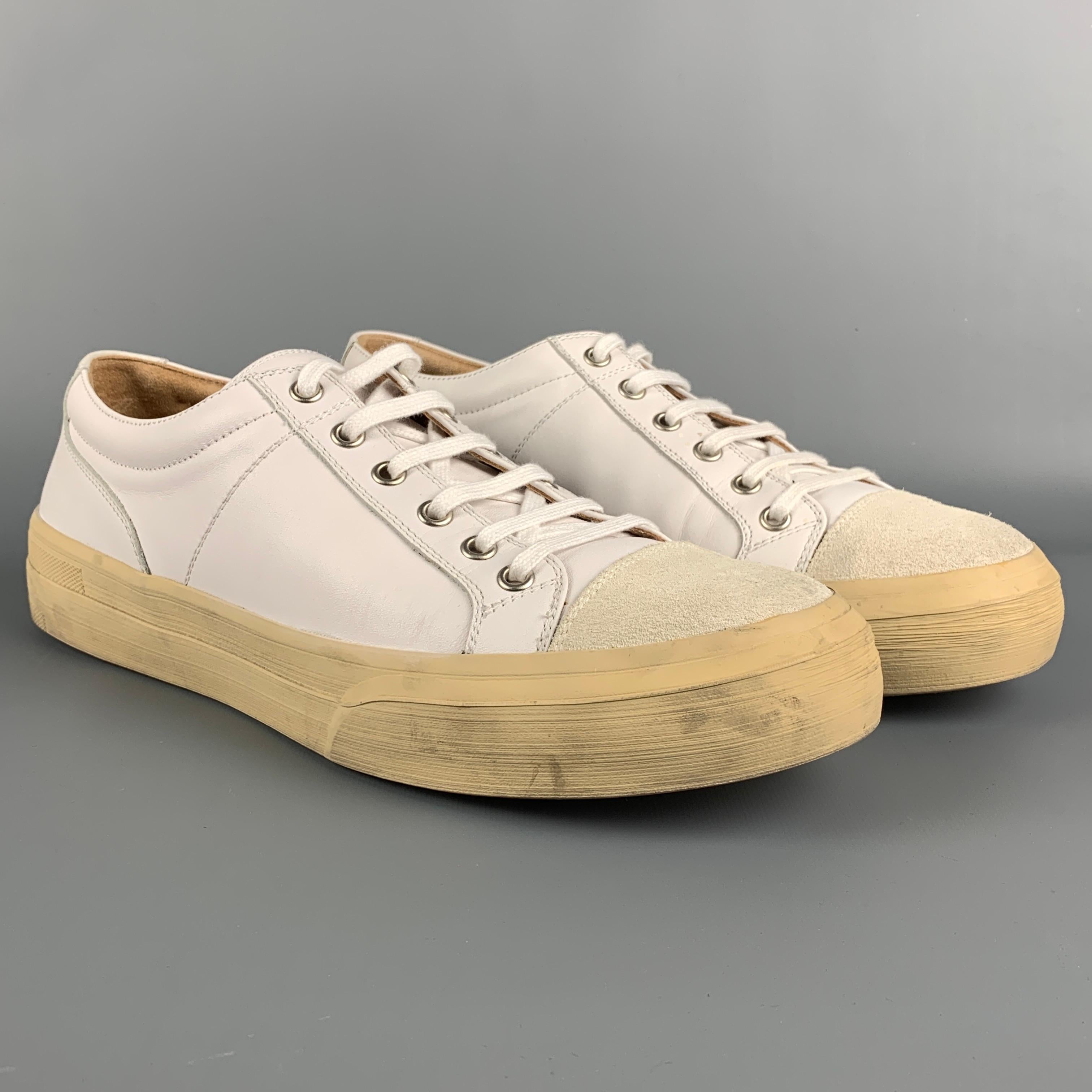 DRIES VAN NOTEN sneakers comes in a white leather featuring a suede toe, rubber sole, and a lace up closure. Includes box. Made in Italy. 

Good Pre-Owned Condition.
Marked: 42
Original Retail Price: $630.00

Outsole: 11.5 in. x 4 in. 