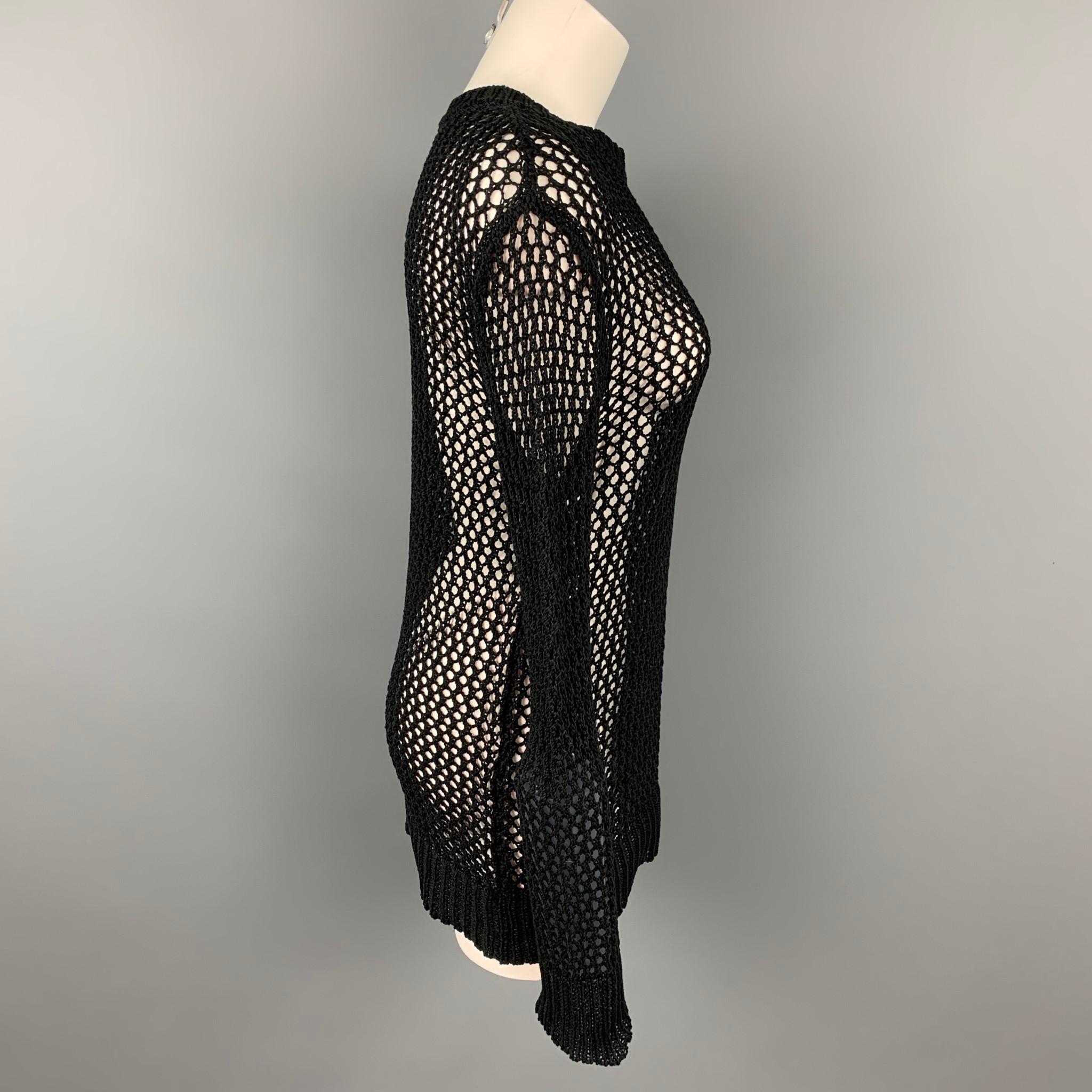 DRIES VAN NOTEN pullover comes in a black mesh cotton featuring a crew-neck. 

Very Good Pre-Owned Condition.
Marked: L

Measurements:

Shoulder: 18 in.
Bust: 38 in.
Sleeve: 29 in.
Length: 28 in. 