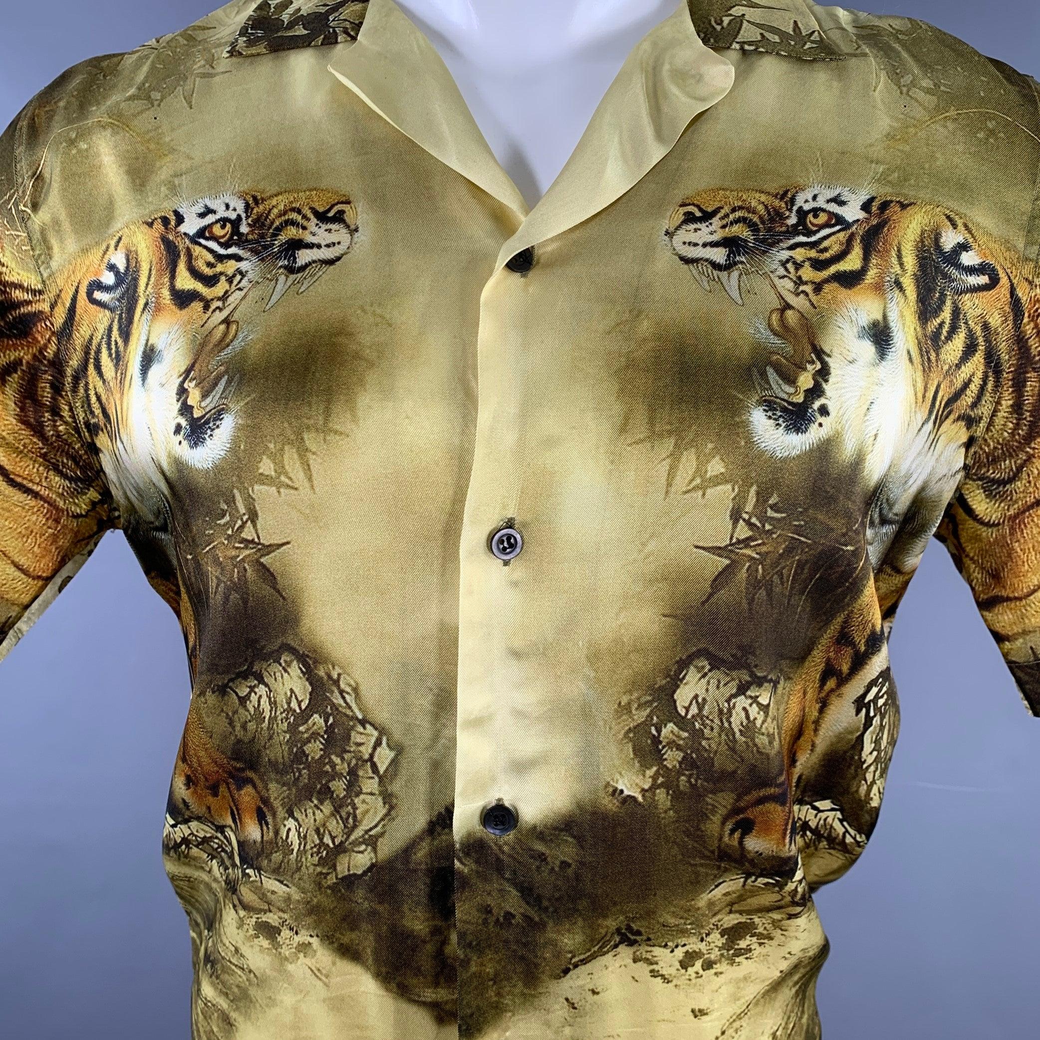 DRIES VAN NOTEN short sleeve shirt
in a yellow and olive green woven fabric featuring an Asian-inspired roaring tigers print, and button closure. Note: this garment has been altered. Please double check measurements.Very Good Pre-Owned Condition.