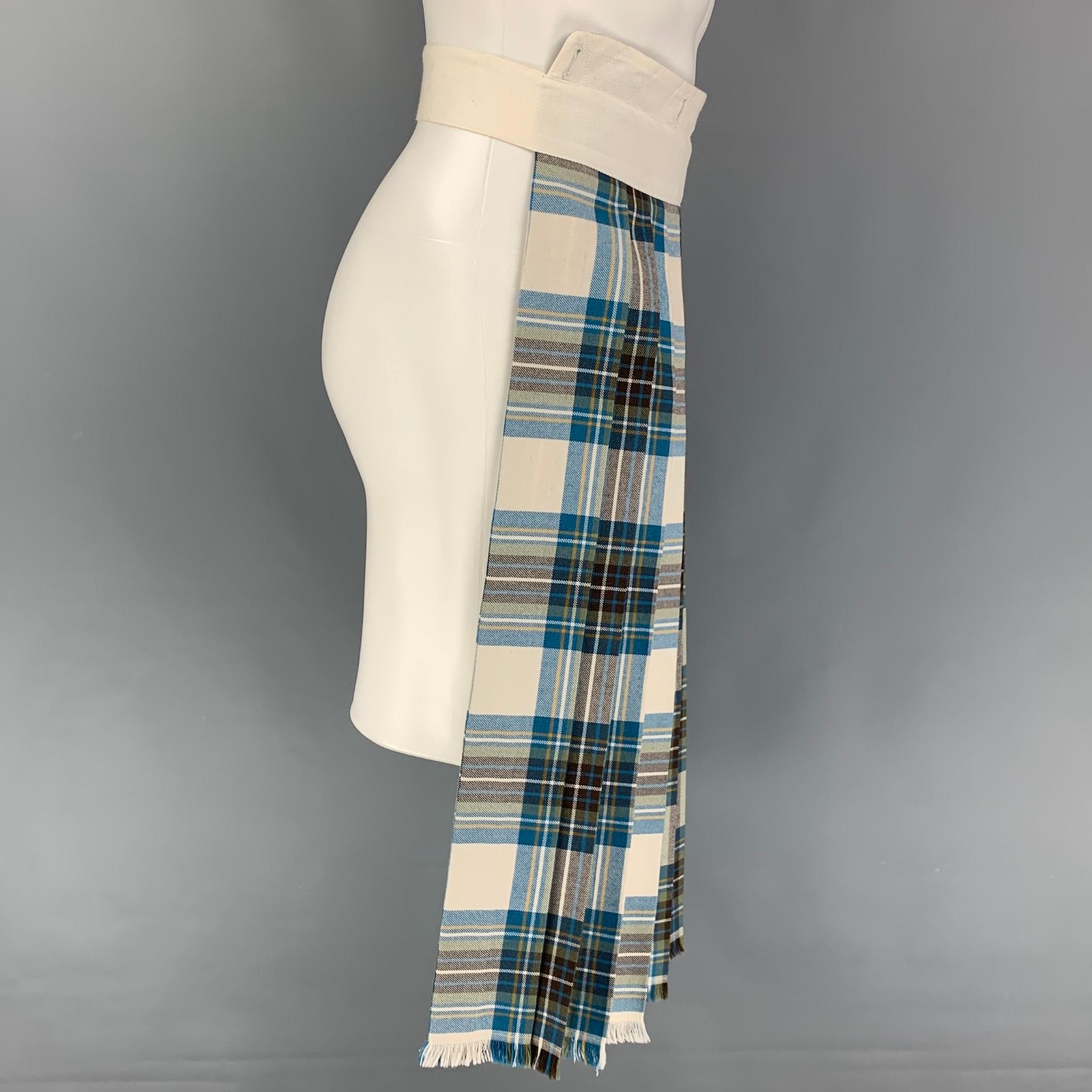 DRIES VAN NOTEN kilt skirt panel comes in a blue & grey plaid material featuring a fringe trim and a adjustable belt.

Very Good Pre-Owned Condition.
Marked: One Size

Measurements:

Waist: 15 in. 
Length: 29 in. 