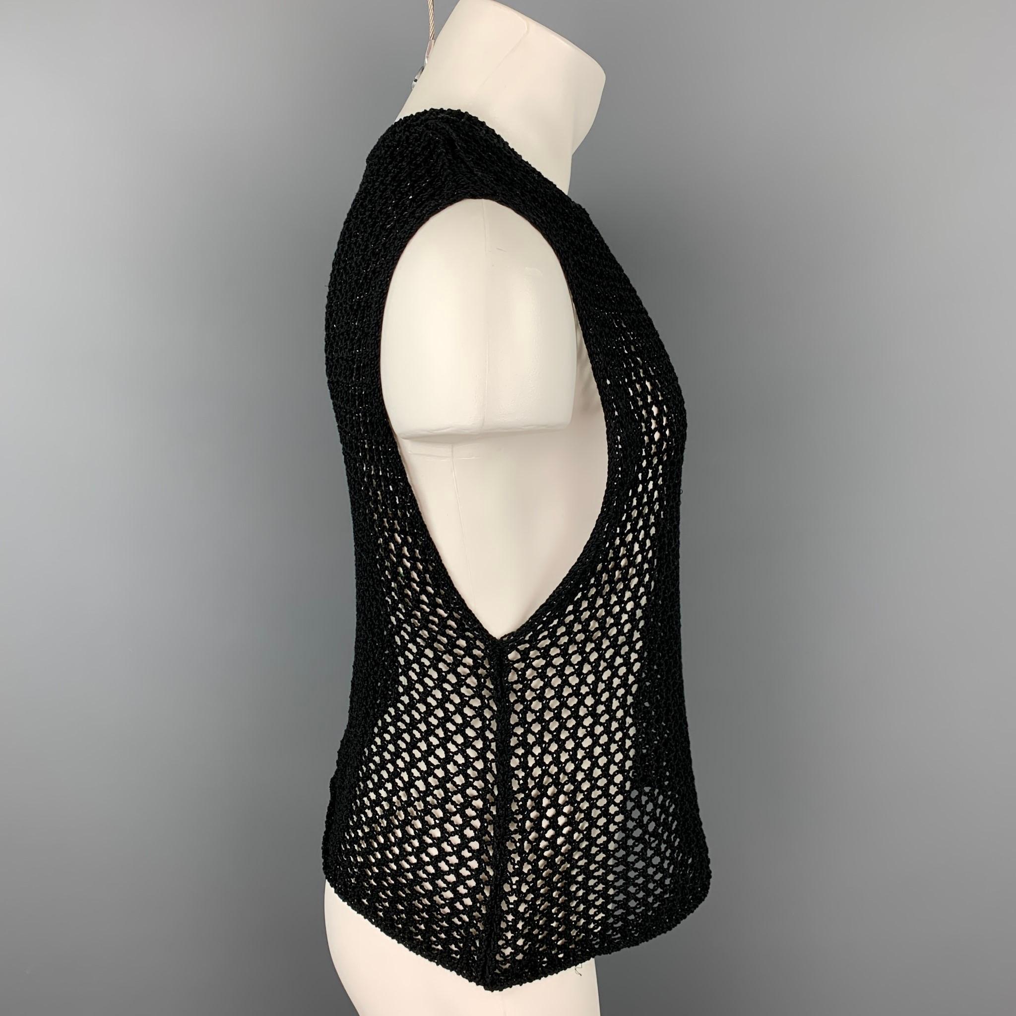 DRIES VAN NOTEN vest comes in a black knitted cotton featuring a crew-neck. 

Very Good Pre-Owned Condition.
Marked: S

Measurements:

Shoulder: 18 in.
Chest: 38 in.
Length: 22.5 in. 