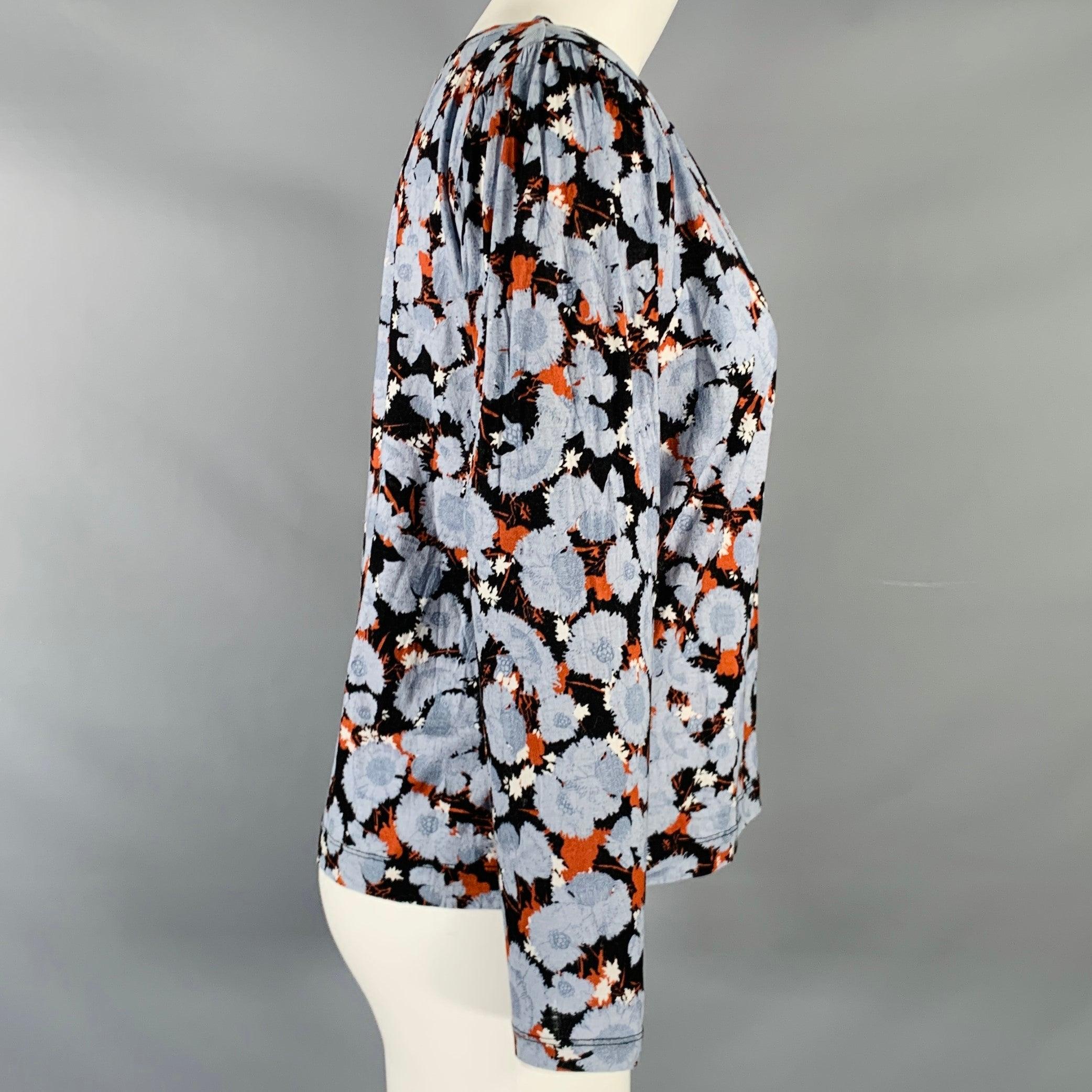 DRIES VAN NOTEN blouse
in a black and brown cotton fabric featuring blue abstract floral print, long sleeves, and boat neck. Made in Portugal.Excellent Pre-Owned Condition. 

Marked:   S 

Measurements: 
 
Shoulder: 15.5 inches  Bust: 38 inches 