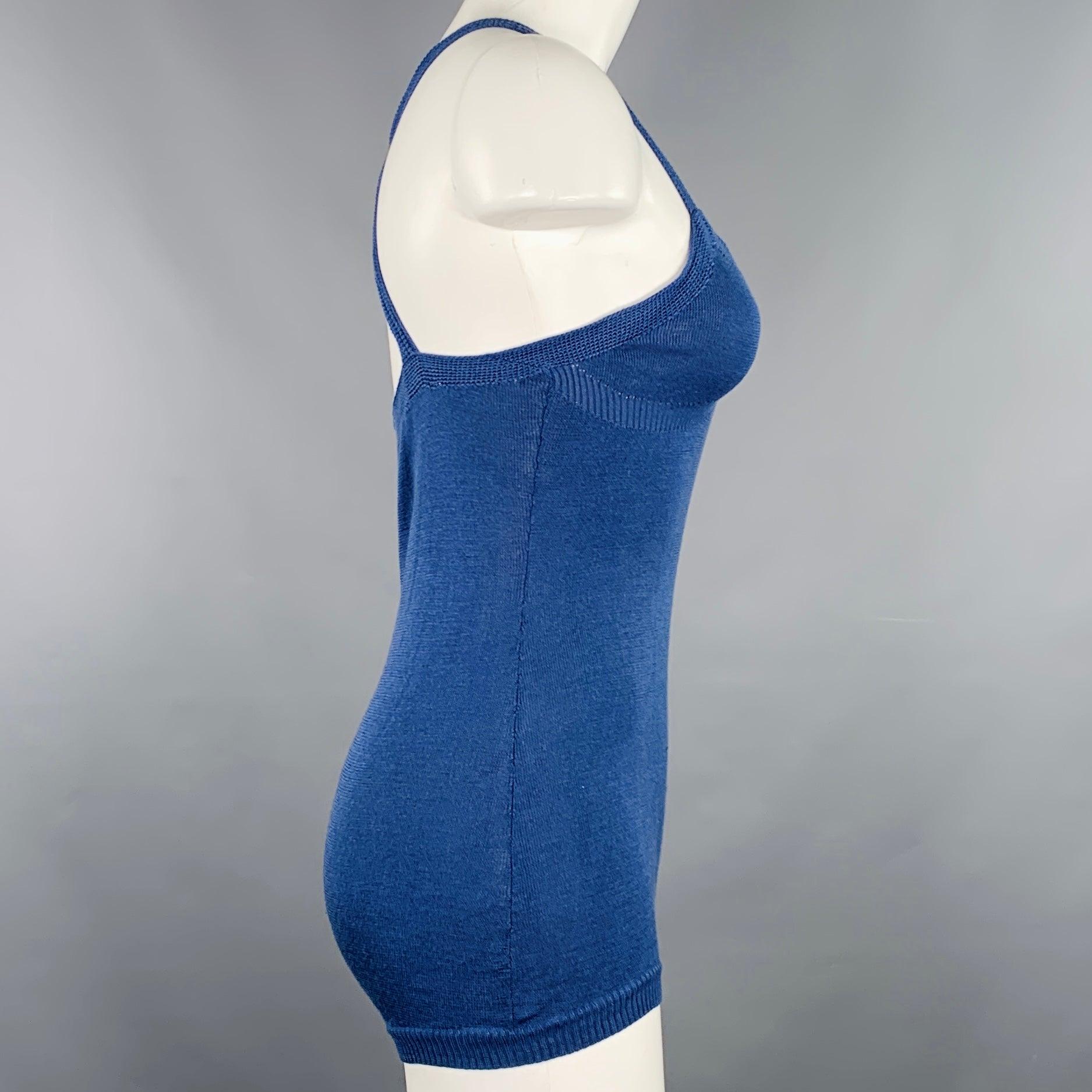 DRIES VAN NOTEN casual top
in a blue silk knit featuring a cross back strap design, and bodysuit style with double snap crotch closure. Very Good Pre-Owned Condition. Minor signs of wear. 

Marked:   S 

Measurements: 
  Bust: 30 inches Length: 19