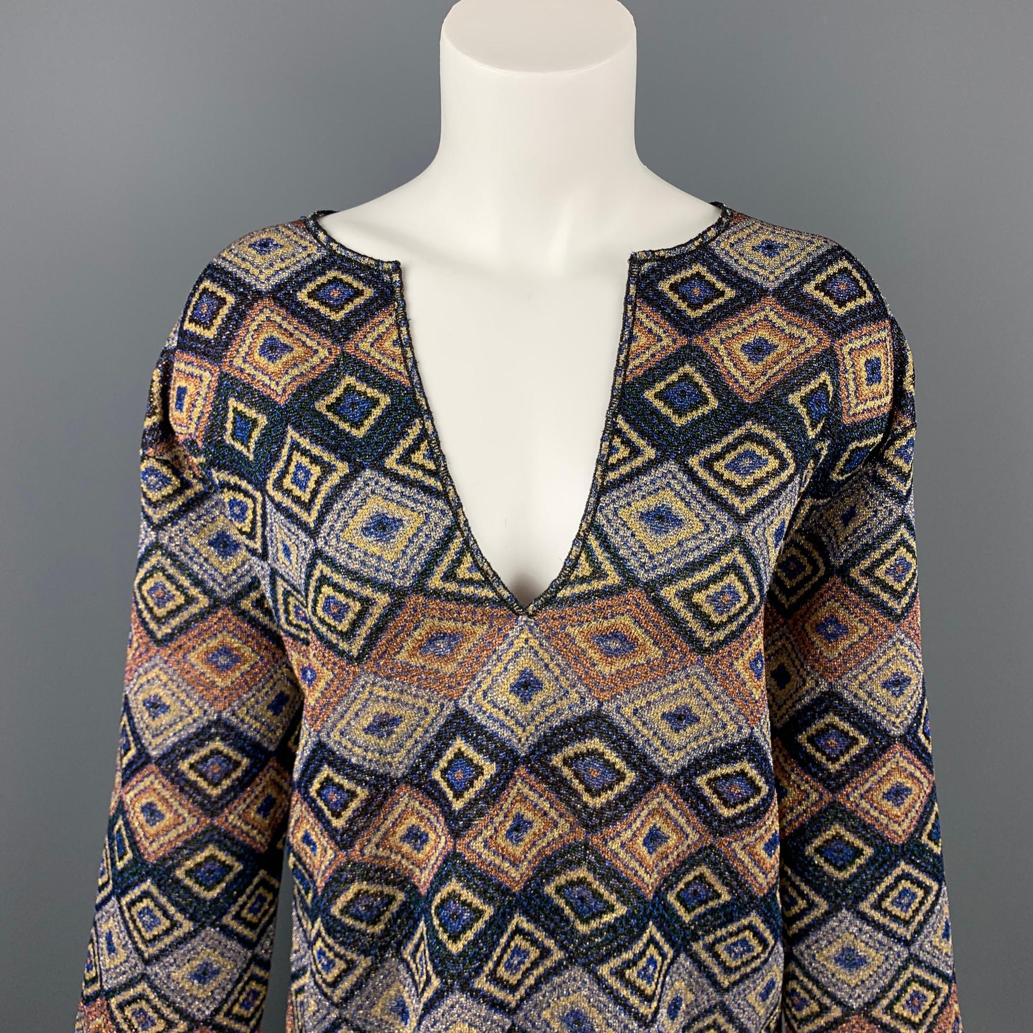 DRIES VAN NOTEN blouse comes in a multi-color jacquard geometric polyester blend featuring a v-neck. Made in Belgium.

Very Good Pre-Owned Condition.
Marked: S

Measurements:

Shoulder: 19 in. 
Bust: 42 in. 
Sleeve: 22 in. 
Length: 28 in. 