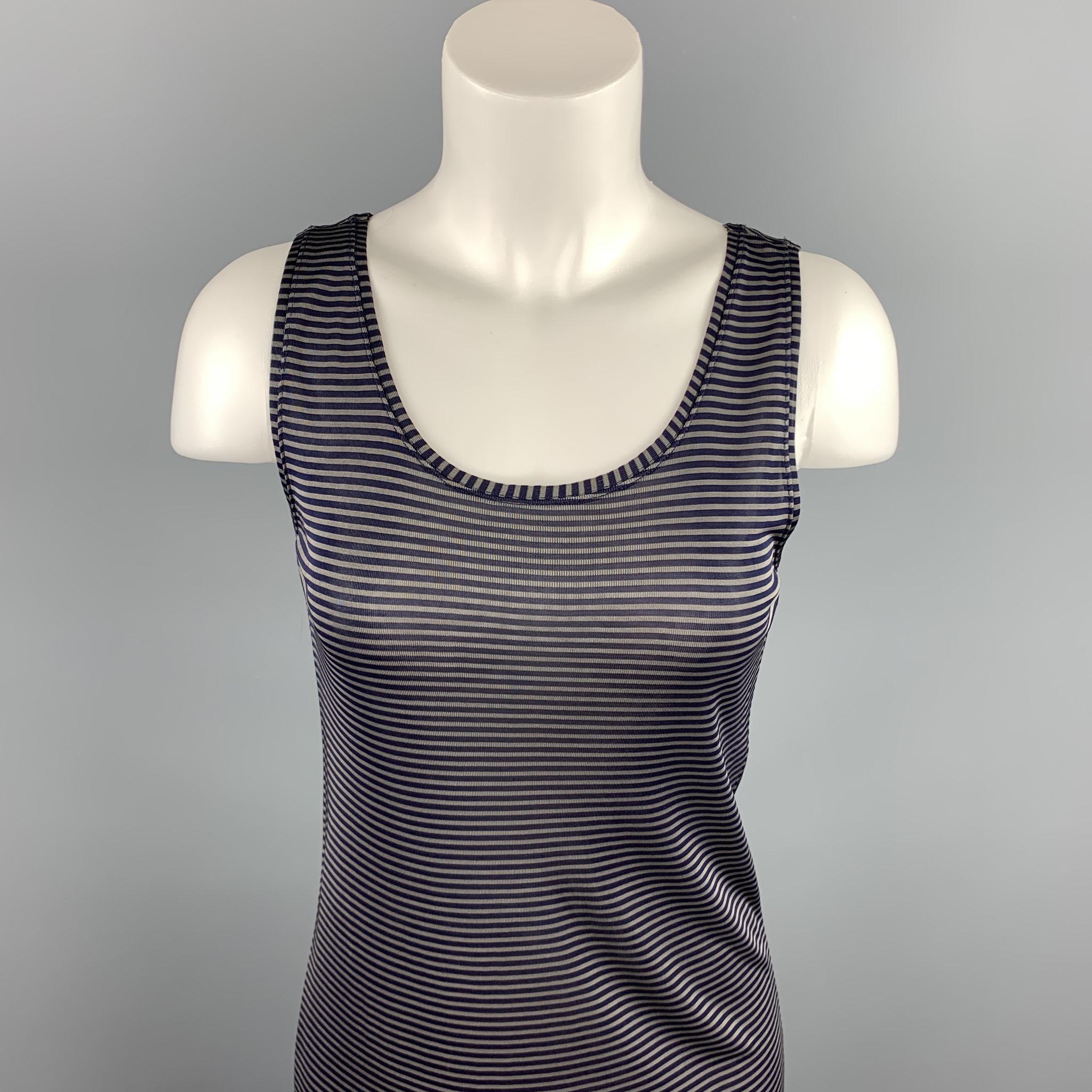 DRIES VAN NOTEN tank dress comes in a navy stripe jersey viscose featuring a round neck. 

Excellent Pre-Owned Condition.
Marked: S

Measurements:

Shoulder: 13.5 in. 
Bust: 28 in. 
Hip: 32 in. 
Length: 33 in. 

SKU: 90077
Category: Dress

More