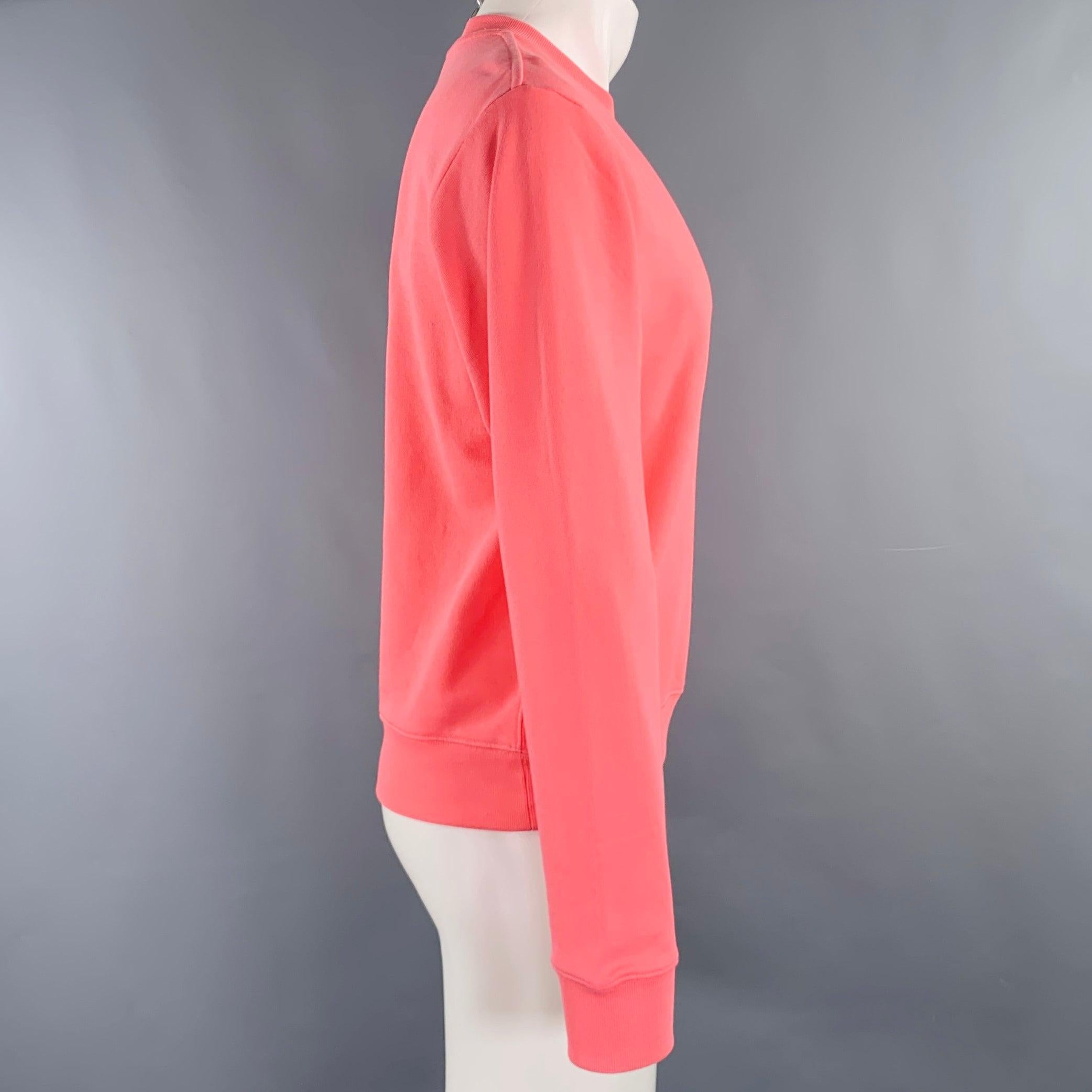 DRIES VAN NOTEN sweatshirt
in a
coral pink cotton knit featuring long sleeves, ribbed cuffs and hem, and crew neck. Note: exact color of garment in photos may differ depending on your device's settings.Very Good Pre-Owned Condition. Minor mark on