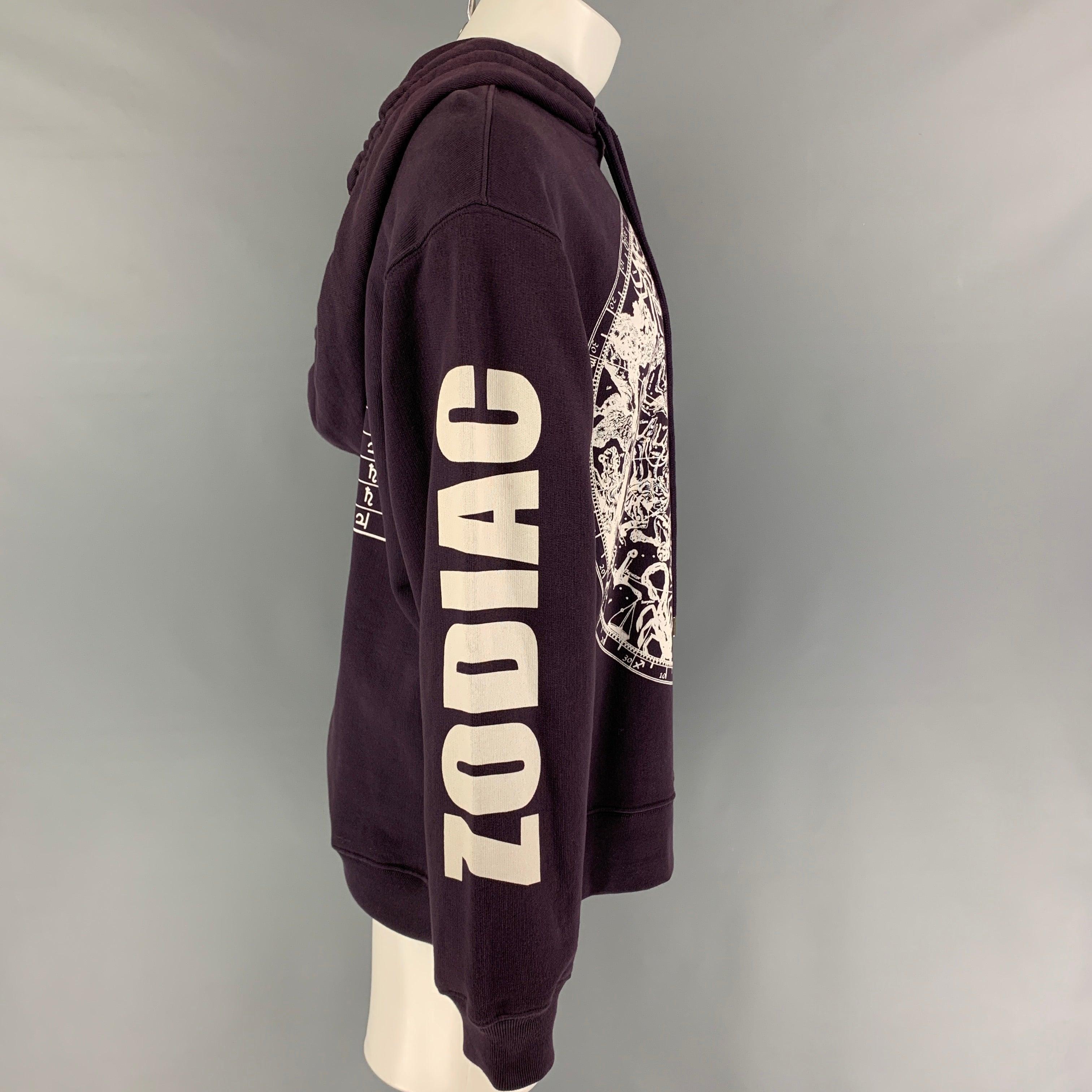 DRIES VAN NOTEN sweatshirt comes in a mauve cotton featuring a oversized fit, zodiac graphic design, double drawstring, and a hooded style.New With Tags. 

Marked:   S 

Measurements: 
 
Shoulder: 24 inches  Chest: 46 inches Sleeve: 25.5 inches 