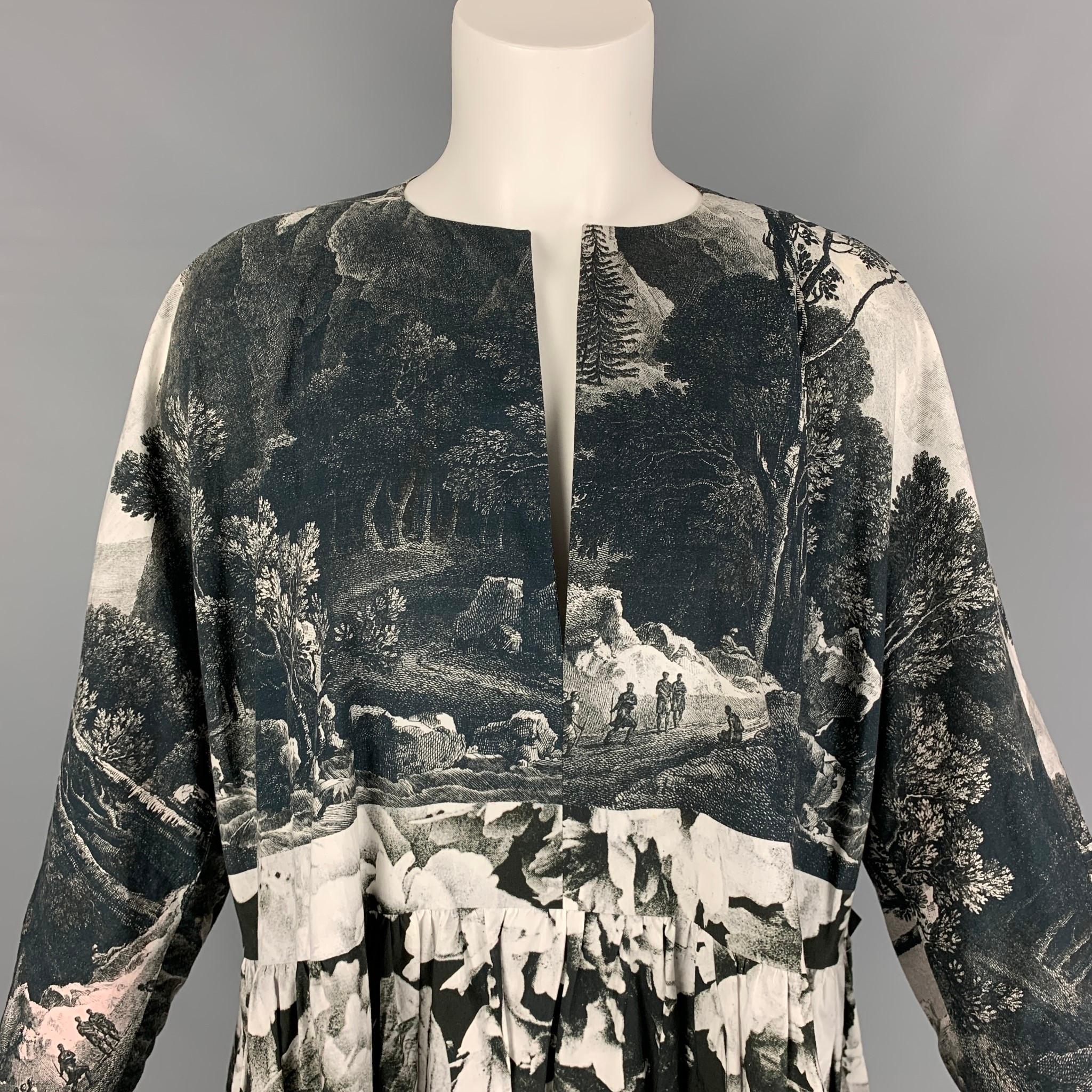 DRIES VAN NOTEN Spring 2012 dress comes in a charcoal & white tapestry cotton featuring a oversized fit, pleated style, 3/4 sleeves, and a v-neck. 

Very Good Pre-Owned Condition.
Marked: S

Measurements:

Shoulder: 23 in.
Bust: 54 in.
Waist: 48