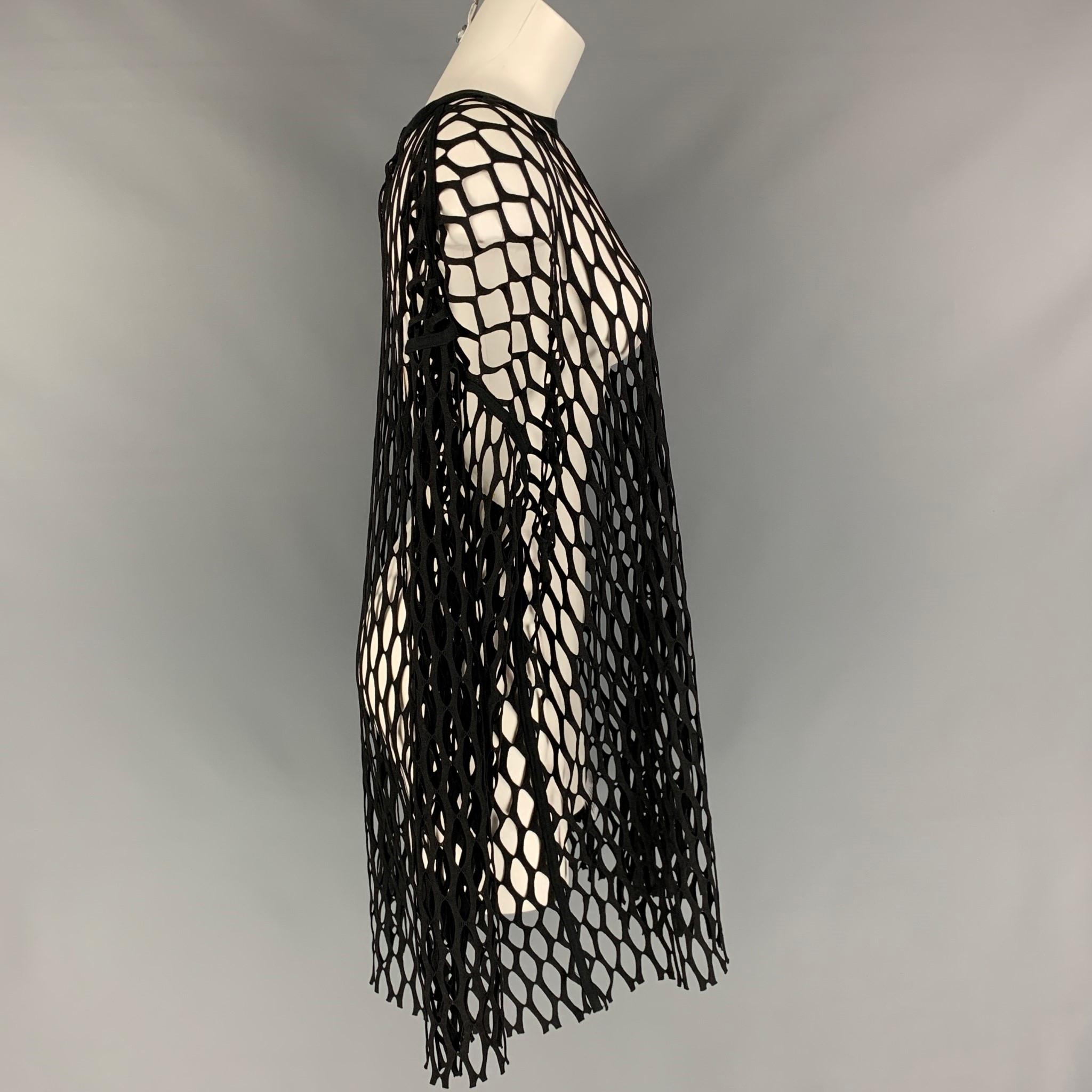DRIES VAN NOTEN Spring-Summer 2021 pullover comes in a black mesh polyester featuring a oversized fit and a crew-neck. 

New With Tags.
Marked: M

Measurements:

Shoulder: 23 in.
Bust: 50 in.
Sleeve: 27 in.
Length: 33 in. 