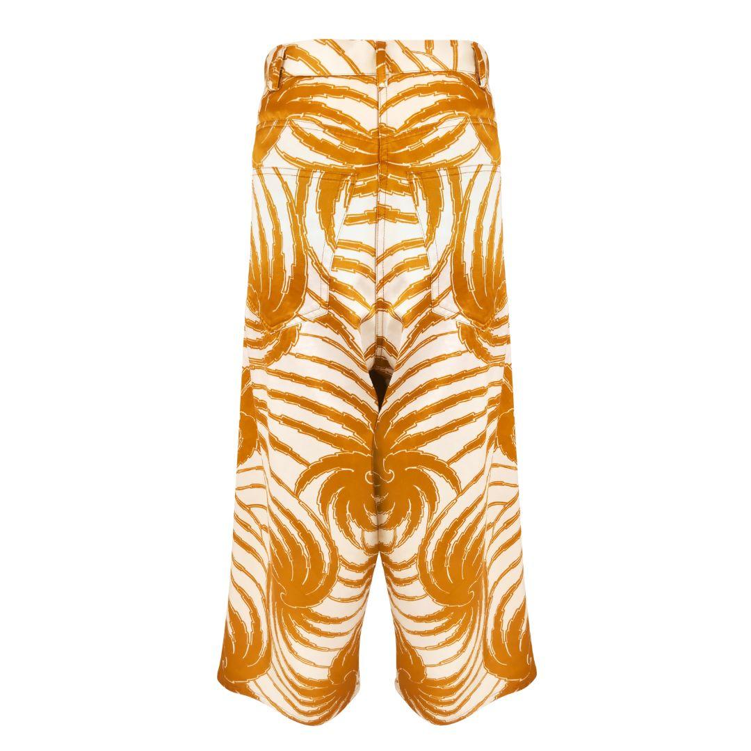 Dries Van Noten orangefarbene und cremefarbene Hose mit weitem Bein und abstraktem Palmenprint. In der Frühjahr/Sommer-Kollektion 2016 auf dem Laufsteg zu sehen.

Das MATERIAL hat eine satinierte Oberfläche mit leichtem Schimmer. Mit Gürtelschlaufen