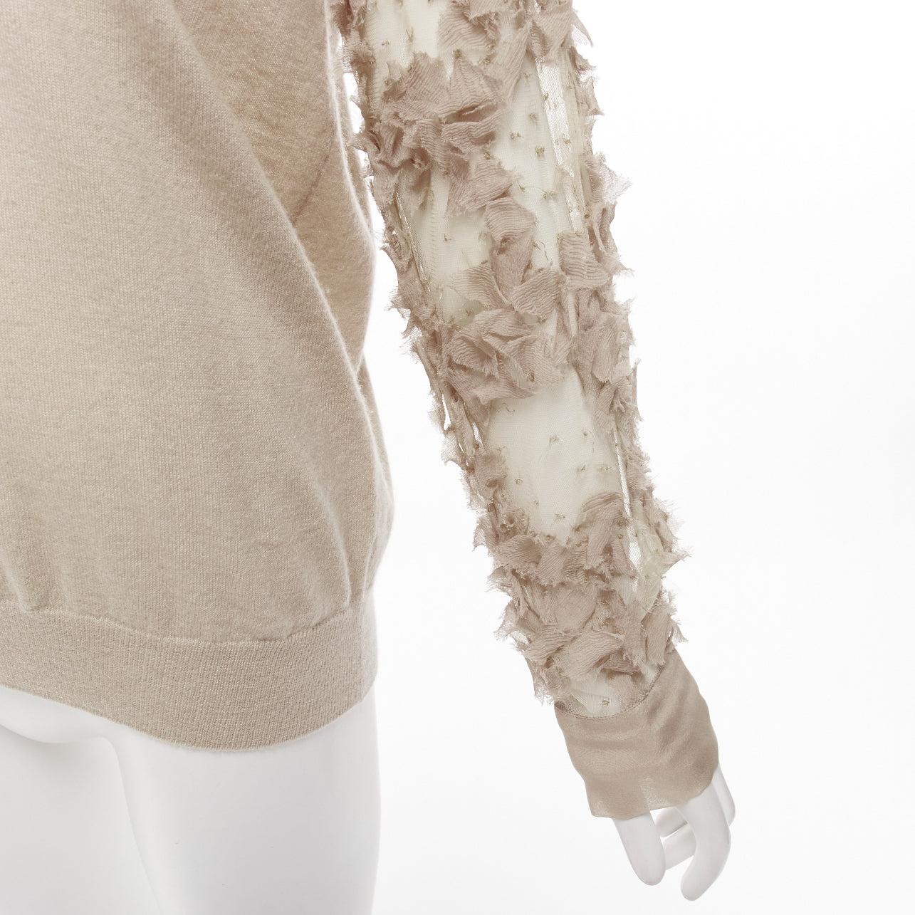 DRIES VAN NOTEN stone cashmere silk ruffle sheer sleeves V-neck sweater S
Reference: NKLL/A00144
Brand: Dries Van Noten
Material: Cashmere, Silk
Color: Stone
Pattern: Solid
Closure: Pullover
Extra Details: Sequins between ruffles.
Made in: