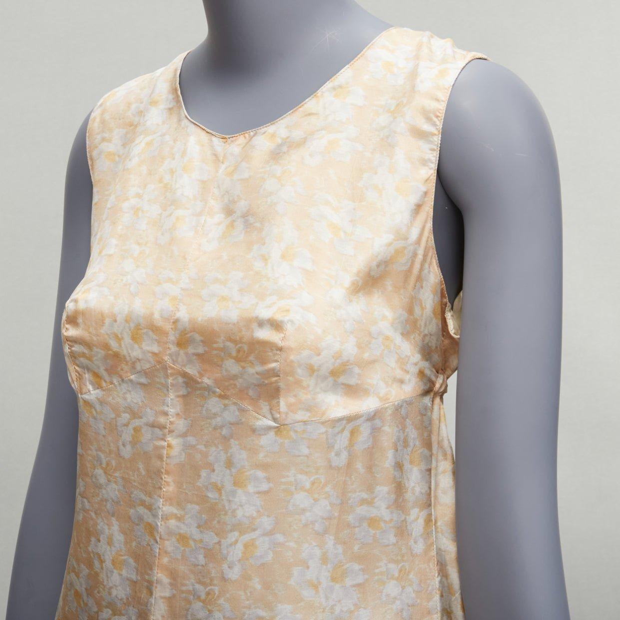 DRIES VAN NOTEN Vintage 100% silk beige daisy print midi dress FR38 M
Reference: PYCN/A00100
Brand: Dries Van Noten
Material: Silk
Color: Beige
Pattern: Floral
Closure: Drawstring
Extra Details: Drawstring waistband adjustable.
Made in: