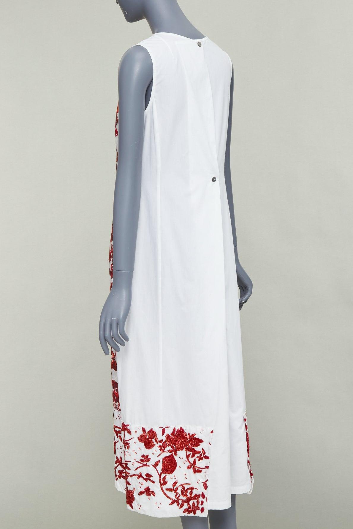DRIES VAN NOTEN Vintage white linen red floral beaded print midi tent dress FR38 M
Reference: TGAS/E00492
Brand: Dries Van Noten
Material: Linen
Color: White, Red
Pattern: Floral
Closure: Button
Extra Details: Mother-of-pearl buttons at nape.
Made