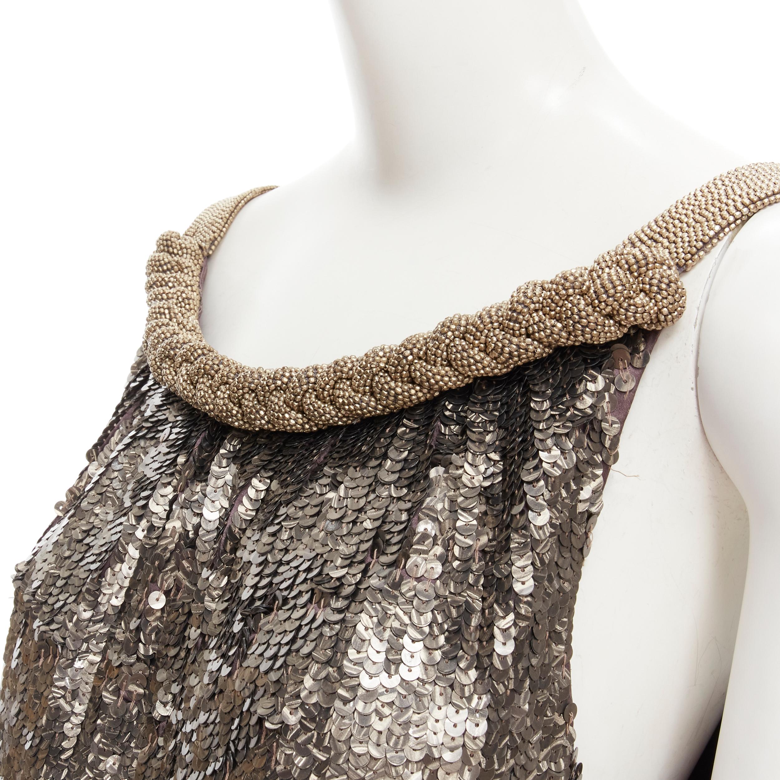 DRIES VAN NOTEN Vintage silver beaded braid neckline silver sequins dress FR40 M
Reference: GIYG/A00148
Brand: Dries Van Noten
Designer: Dries Van Noten
Material: Silk
Color: Silver
Pattern: Solid
Extra Detail: Silver beaded braid trim neckline.
