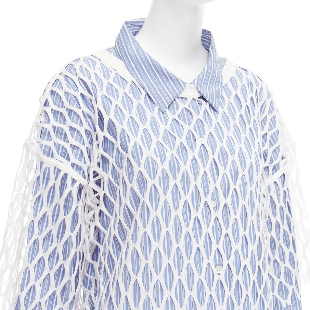 DRIES VAN NOTEN white blue cotton fishnet overlay shirt dress FR34 XS
Reference: NKLL/A00026
Brand: Dries Van Noten
Material: Cotton
Color: Blue, White
Pattern: Striped
Closure: Button
Lining: Blue Cotton
Made in: Hungary

CONDITION:
Condition:
