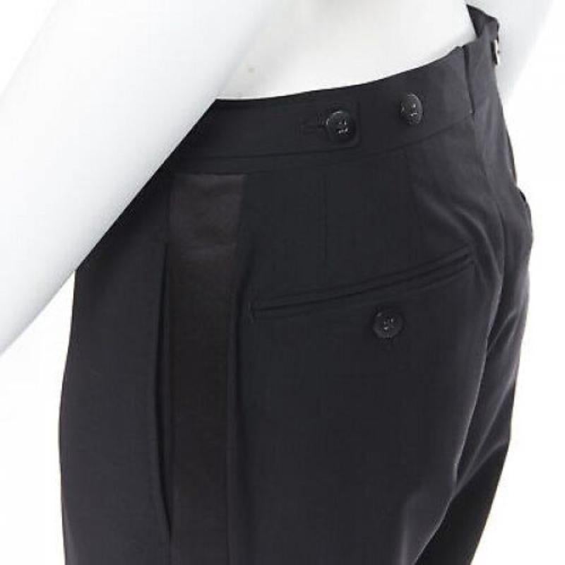 DRIES VAN NOTEN wool cotton blend black verticle striped cropped trousers IT46 S
Reference: CRTI/A00285
Brand: Dries Van Noten
Model: Slim trousers
Material: Wool, Cotton
Color: Black
Pattern: Striped
Closure: Zip
Extra Details: Slim leg