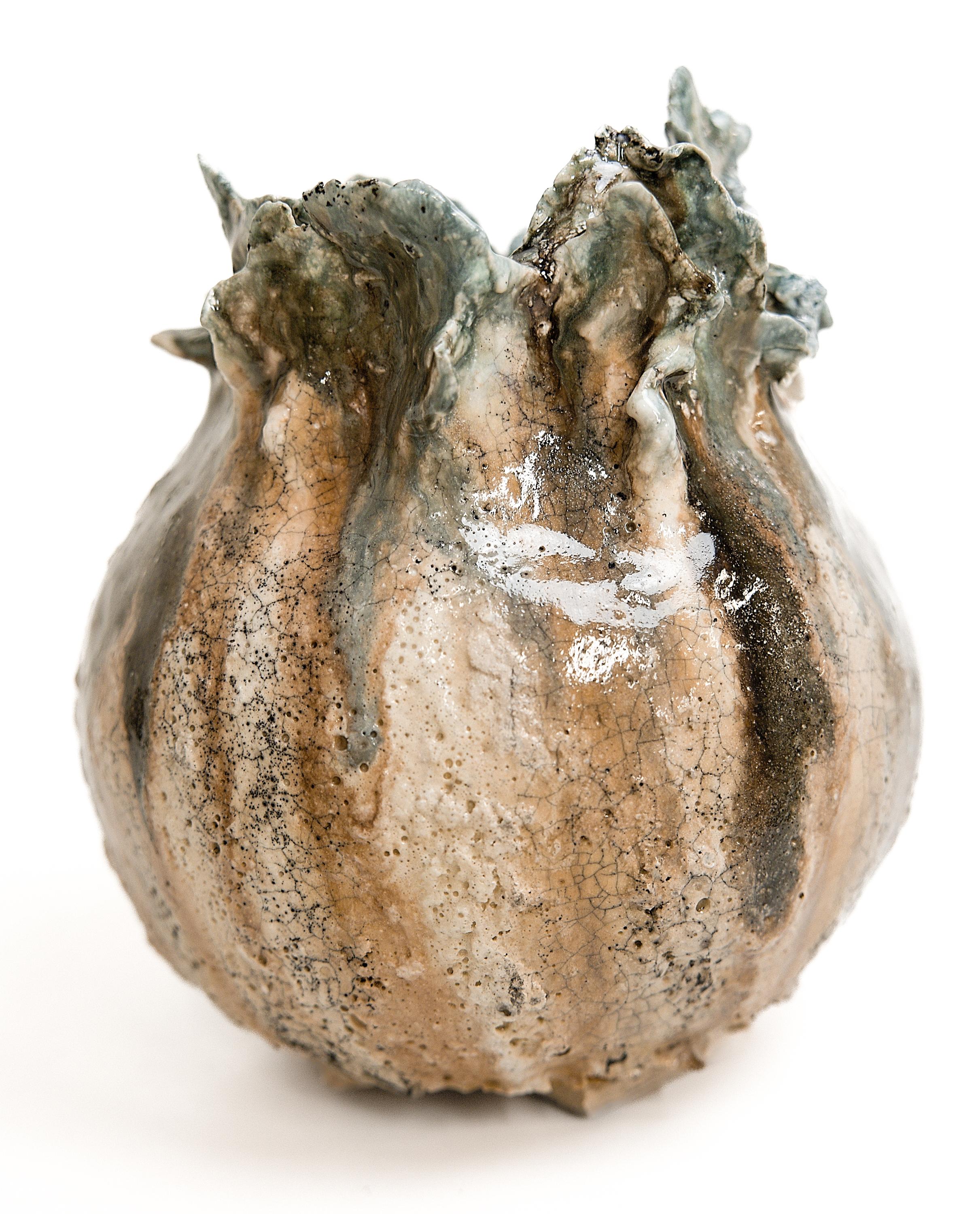 Bring a touch of modern style to your home with our Yeonhwa Jars. ( Lotus Flower Jars)
this White moon jar with with deep greens and lava glaze

., each striking vase features a unique, moon-like design in an eye-catching light lava glaze.
Please