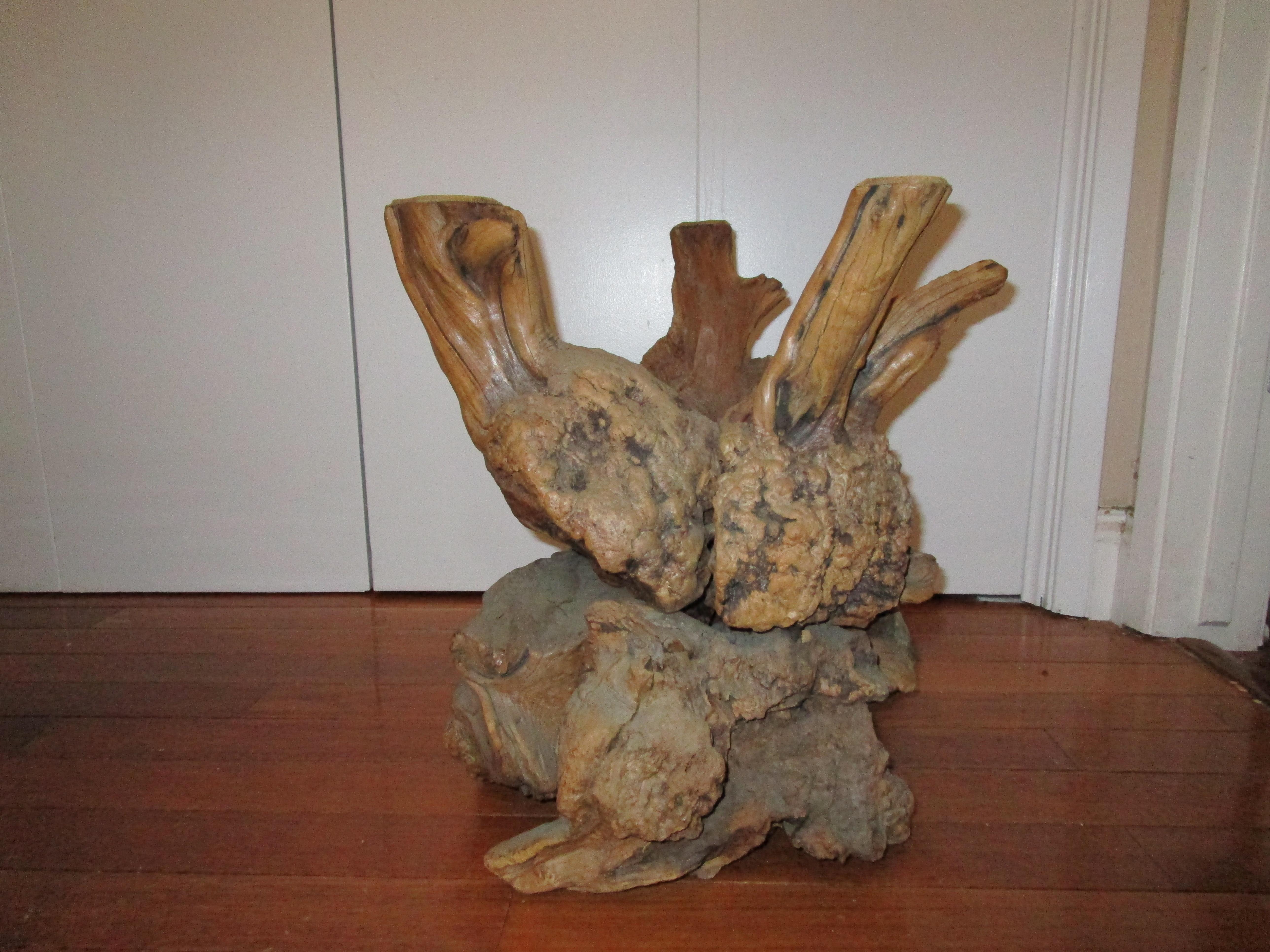 This is unique, like most driftwood formations. A burl driftwood and glass coffee or occasional table base. The glass top is for display only.
This is from the 1980s--a bulbous footed base, with out-flaring supports. This is hefty, solid and in very