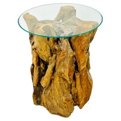 Mesa pedestal de madera de deriva con tapa de cristal