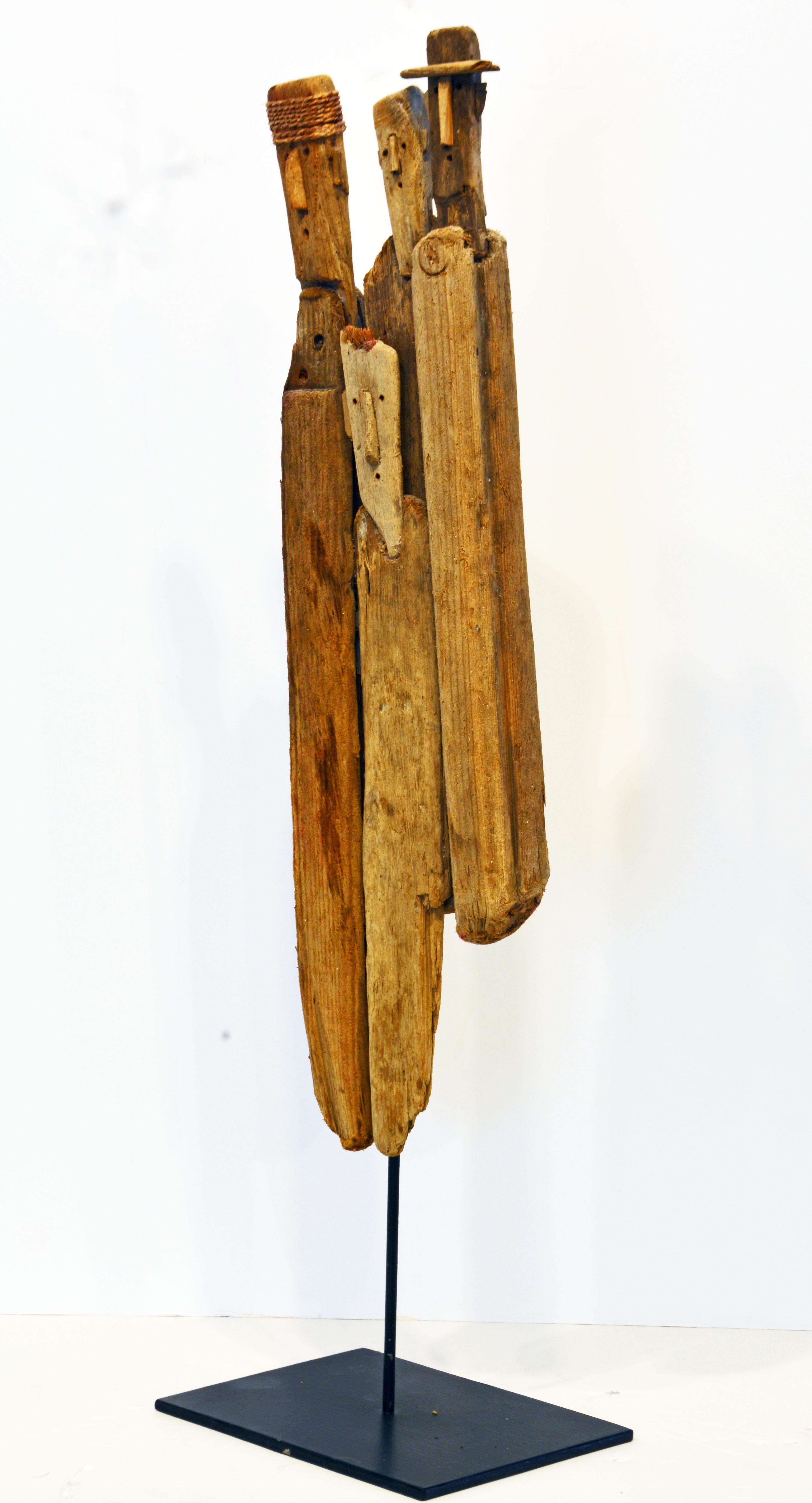This a wonderful driftwood sculpture or assemblage by Marc Bourlier originally purchased at Galerie Beatrice Soulier in Paris when the gallery had their exhibition 'Small de Marc Bourlier'. I represents four figures each of them personalized by