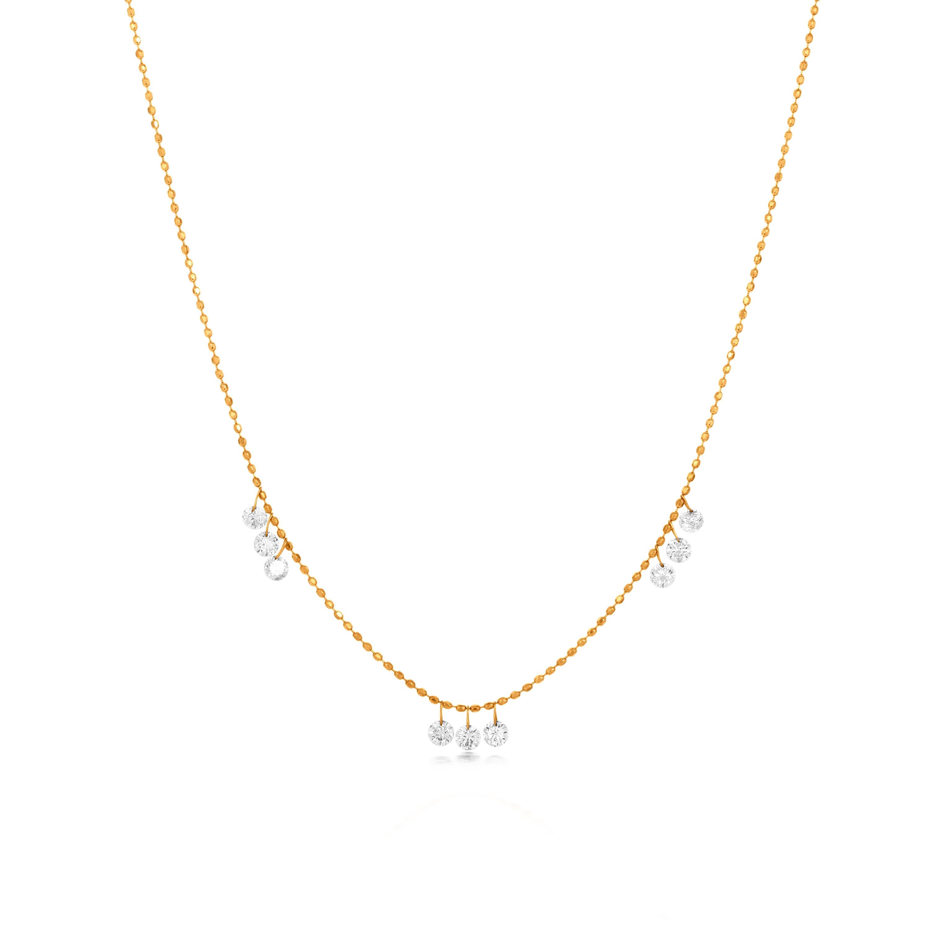 This Luxle 0.5 carat drill diamond frontal necklace is made with 9 drop-shaped motifs of round full cut white diamonds in 3 clusters. The round diamonds are suspended from an 18k yellow gold bead chain. This gold bead chain is 18 inches long and has