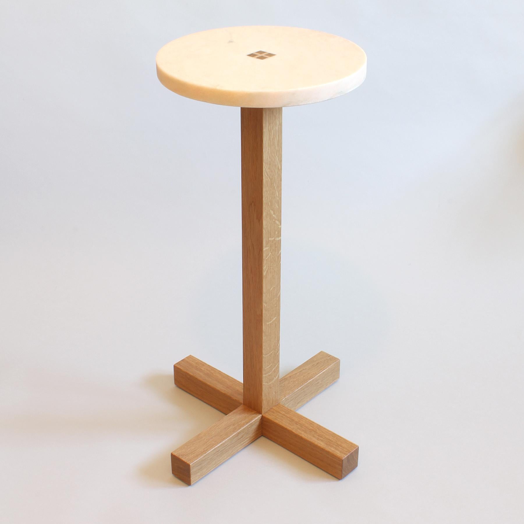 Pink marble top with honed matte finish and slightly translucent, joined to solid white oak base. Traditional solid wood Japanese style joinery, all pieces fit together precisely and permanently without the use of hardware. 

Optimal height for
