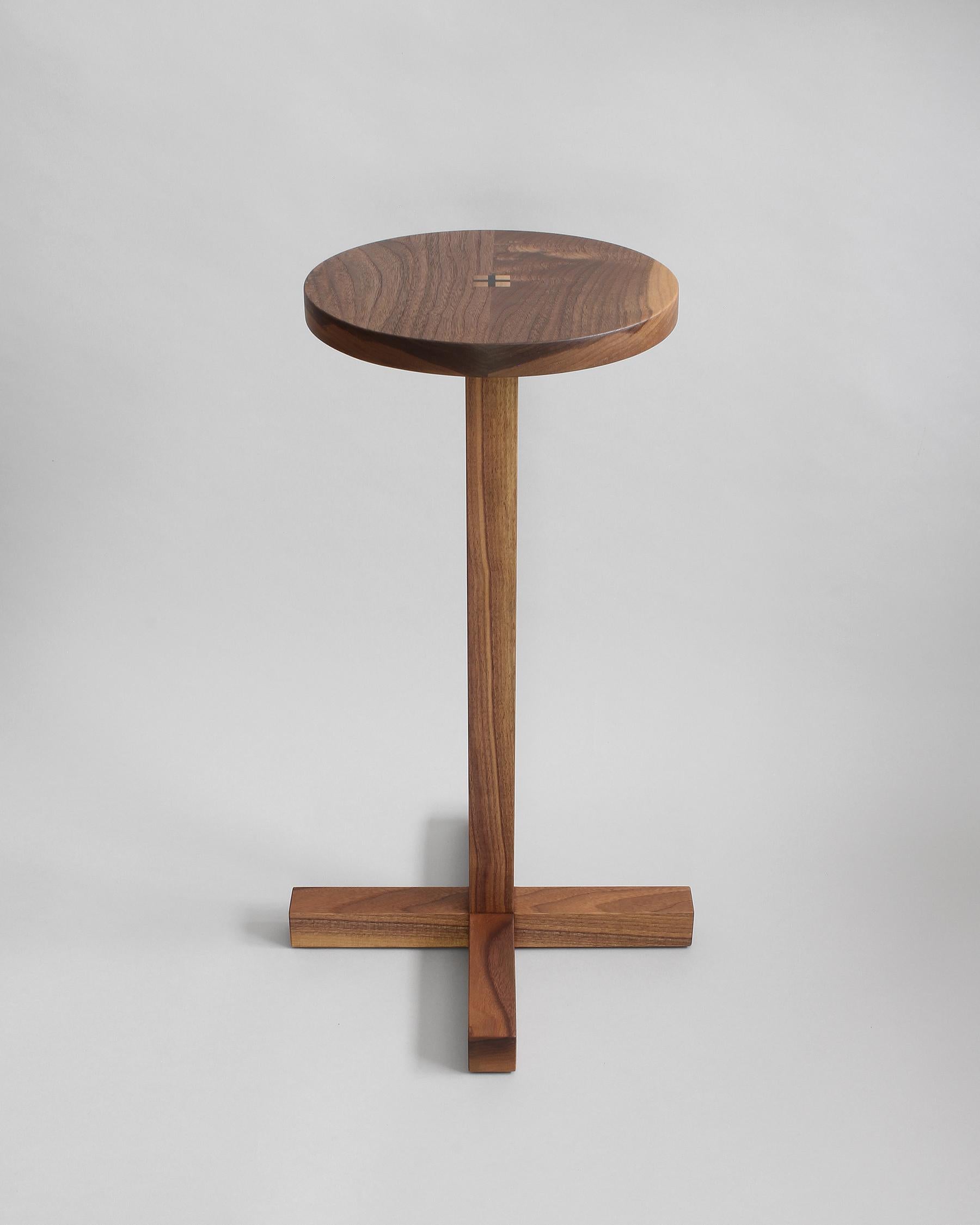 Drink Table with solid California Black Walnut top joined to a solid walnut base.  The table pictured is ready to ship. Ebony wedges at center table top are driven permanently into place to combine  top with base. The base is constructed with