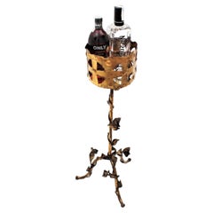 Support à boissons en fer doré avec motif floral de feuillage