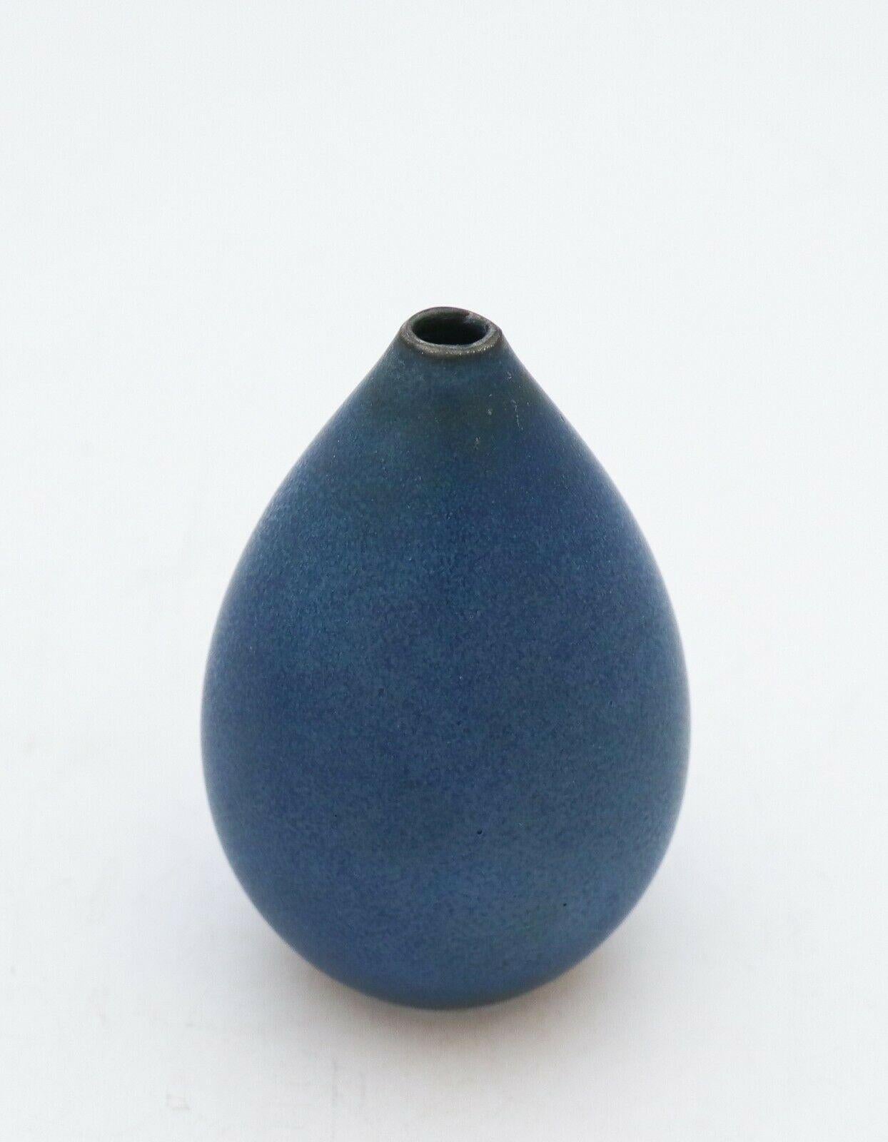 A beautiful midcentury Swedish vase in stoneware by Rörstrand, designed by Carl-Harry Stålhane. It is marked as 2nd quality with the white line through the backstamp, because of some minor marks in the glaze.

Carl-Harry Stålhane is one of the top