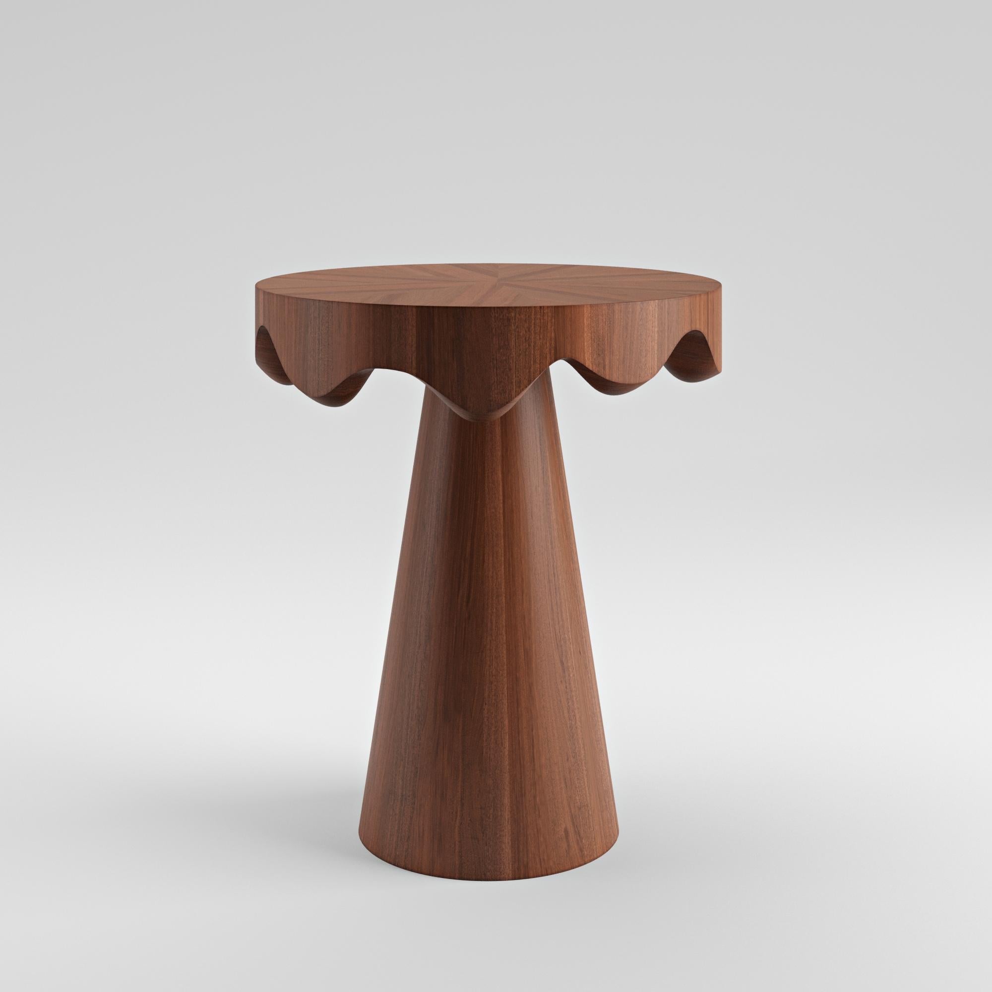 Made-to-order
Dripotlé Mahogany
Side table by T. Woon

The exquisite mahogany side table is indeed a manifestation of the designer's pristine aesthetics, boasting a captivating and curious appearance. Meticulously handcrafted by skilled artisans