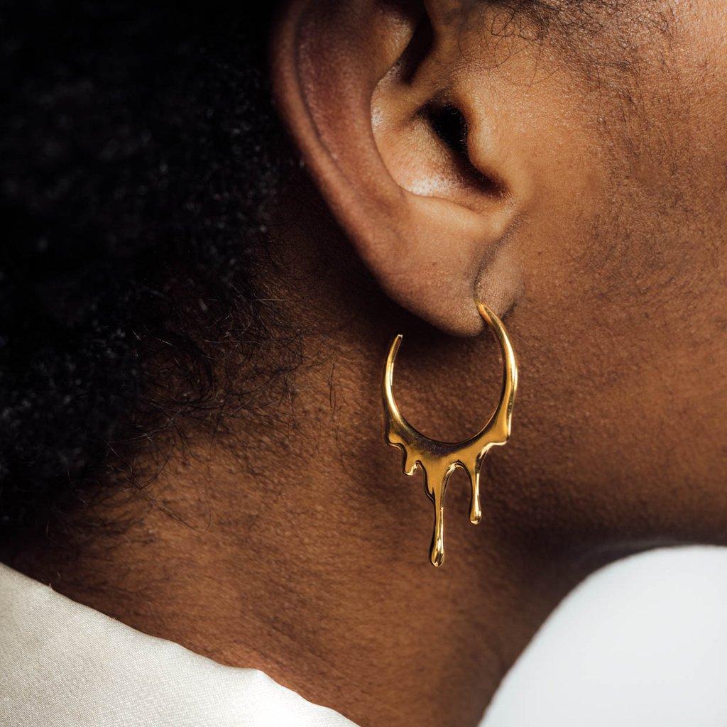 gold dripping earrings