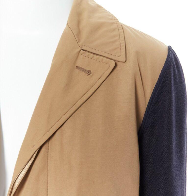 DRIS VAN NOTEN mens khaki navy blue duo-colour trench-coat removable inner Small
Reference: ESWN/A00008
Brand: Dries Van Noten
Material: Polyamide
Color: Khaki, Navy
Pattern: Solid
Closure: Button
Extra Details: Trench coat. Knitted sleeves. Duo