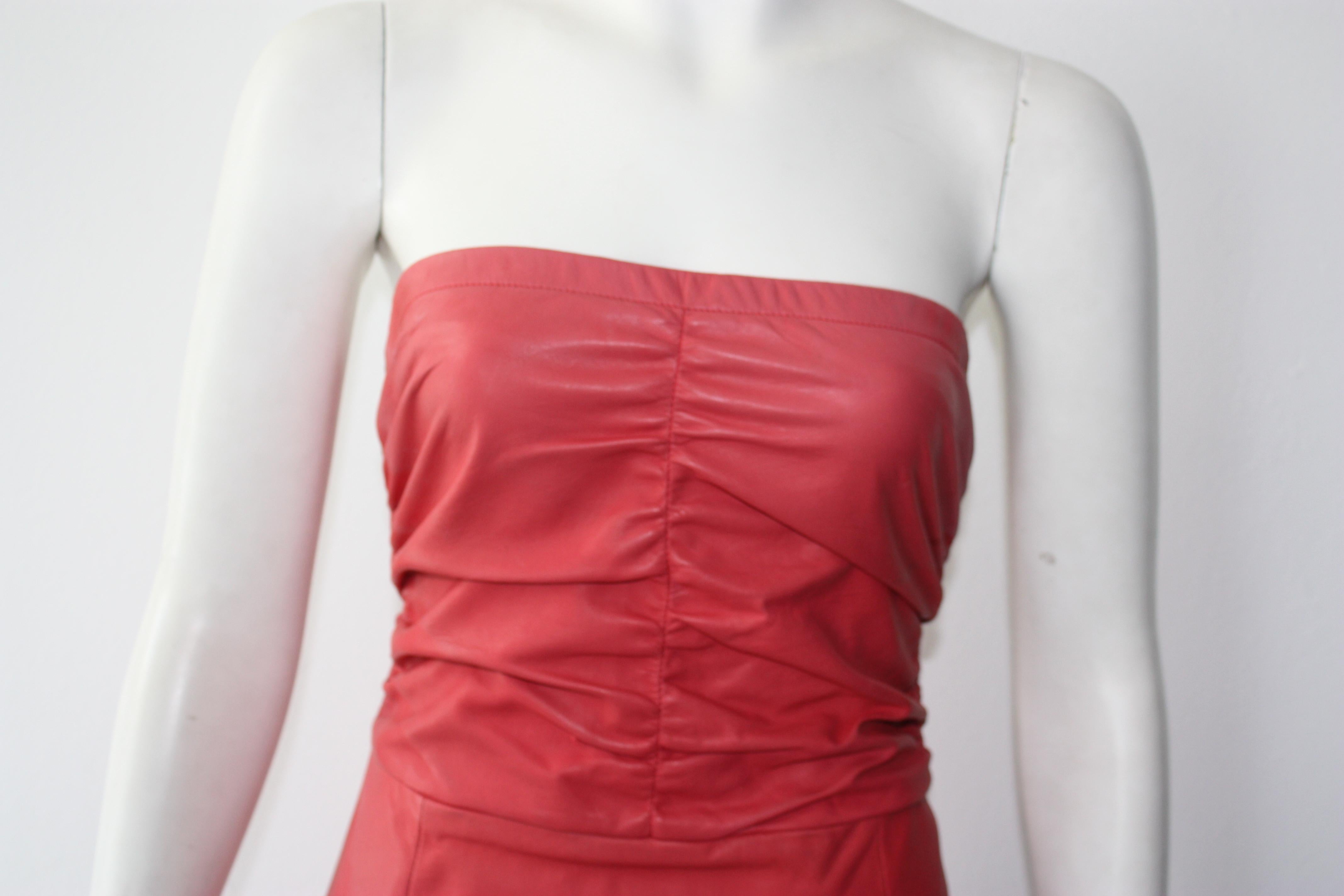 DROMe strapless pink dress. 
Color is in between a coral and a pink . Super fun! 
100% leather. Lining 68% acetate, 32% polyester.

Size S.