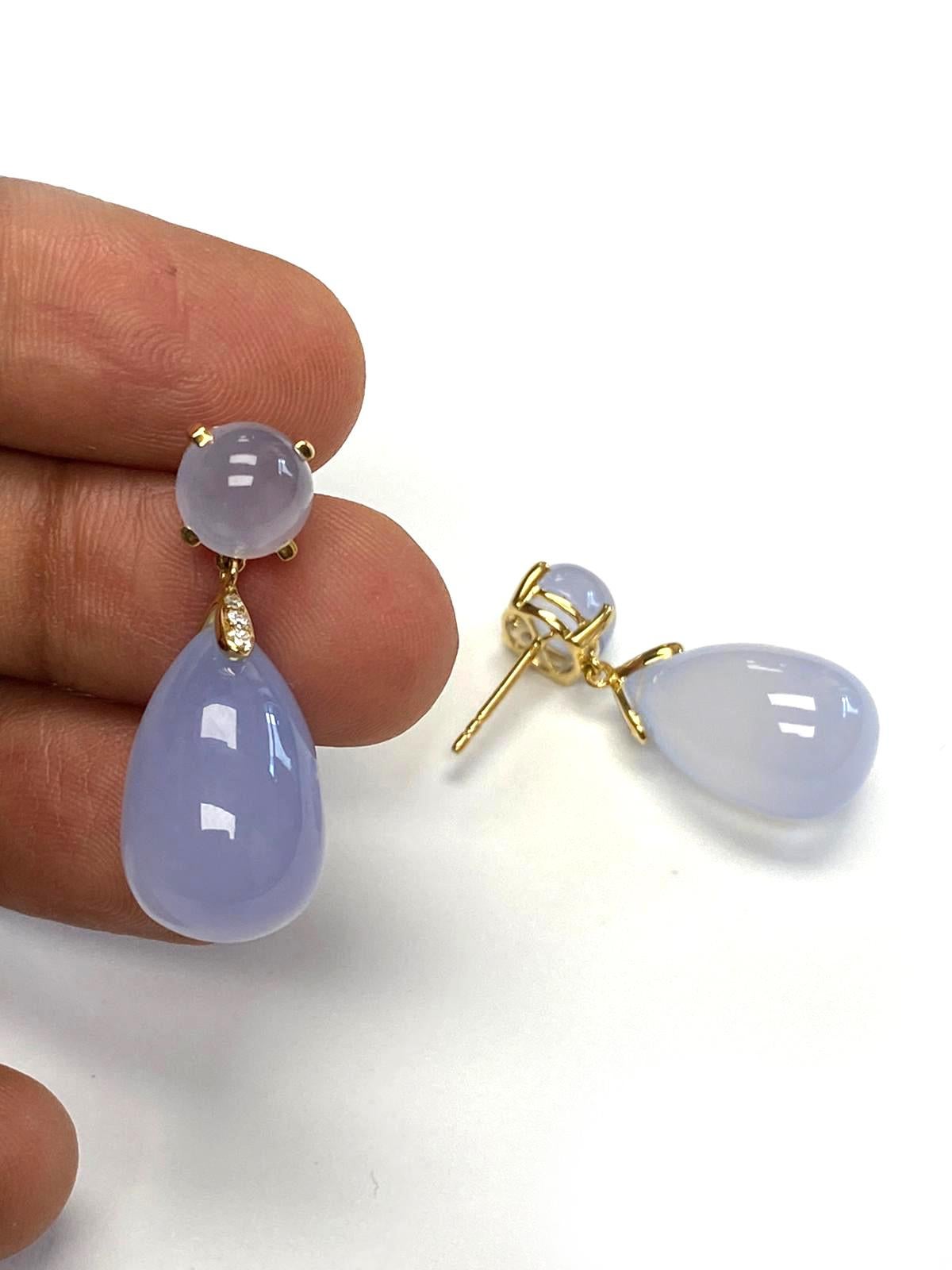 Drop & Cabochon Blue Chalcedony Earrings with Diamonds in 18K Yellow Gold, from 'Naughty' Collection.

Stone Size: 19 x 12 mm (Drop) & 8 mm (Cabochon)

Diamonds: G-H / VS; Approx. Wt: 0.06 Carats