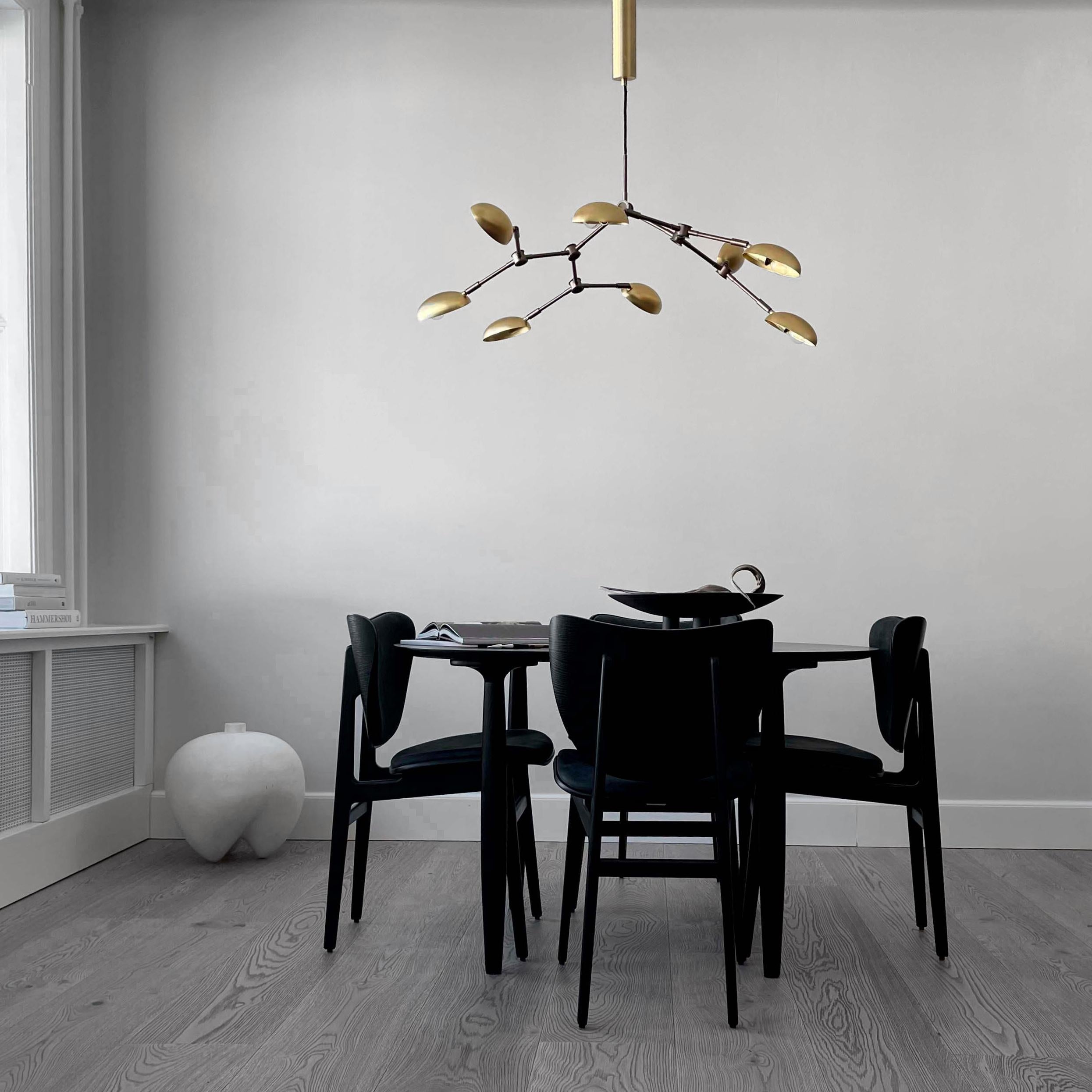 Drop chandelier brass by 101 Copenhagen
Designed by Kristian Sofus Hansen & Tommy Hyldahl.
Dimensions: L155 x W91 x H21 cm
Materials: Brass; Lampshade & Ceiling cup: 100% Iron, with the plated brass finish; Pipes & attachment parts are made of