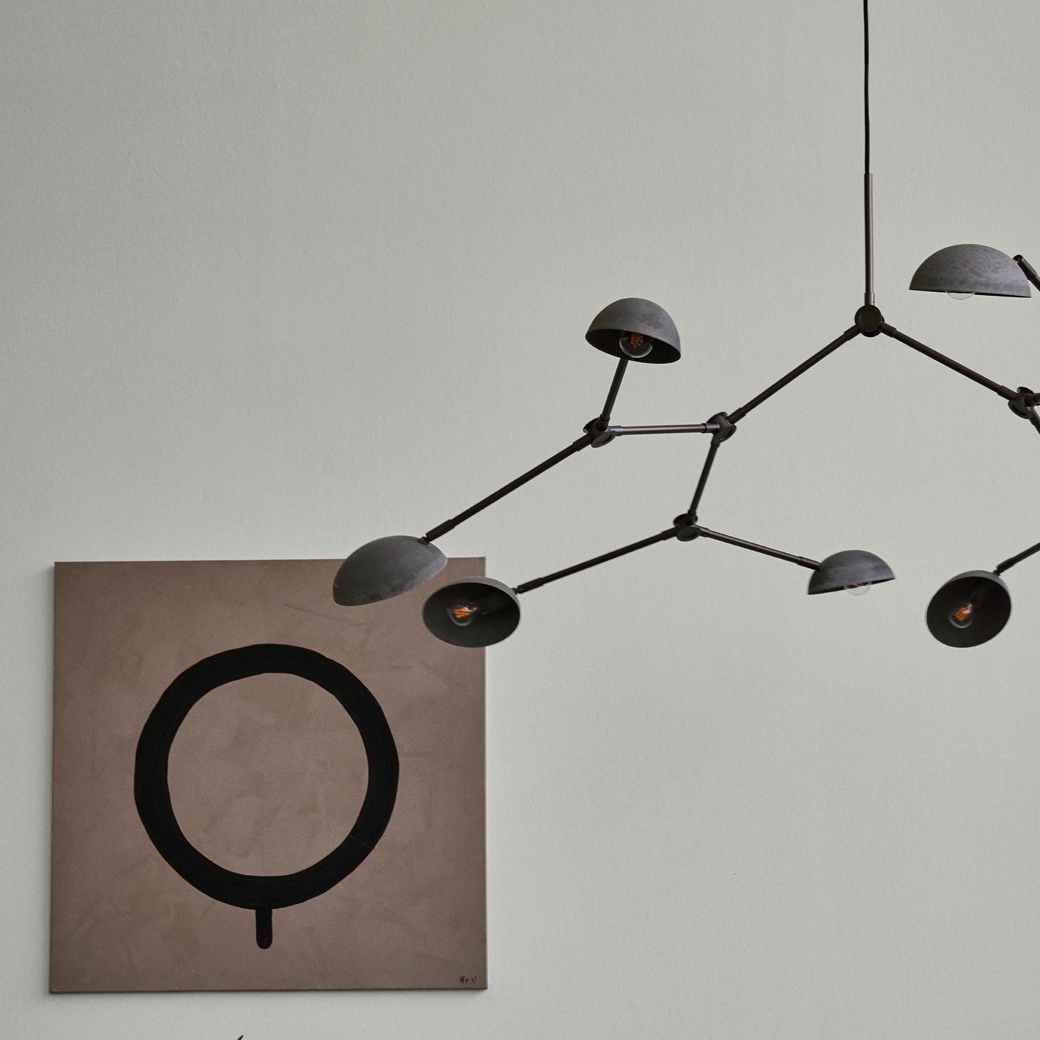 Drop chandelier bronze by 101 Copenhagen
Designed by Kristian Sofus Hansen & Tommy Hyldahl.
Dimensions: L155 x W91 x H21 cm
Materials: bronze; lampshade & ceiling cup:100% Iron, with plated Bronze finish
Pipes & attachment parts is made of 100%
