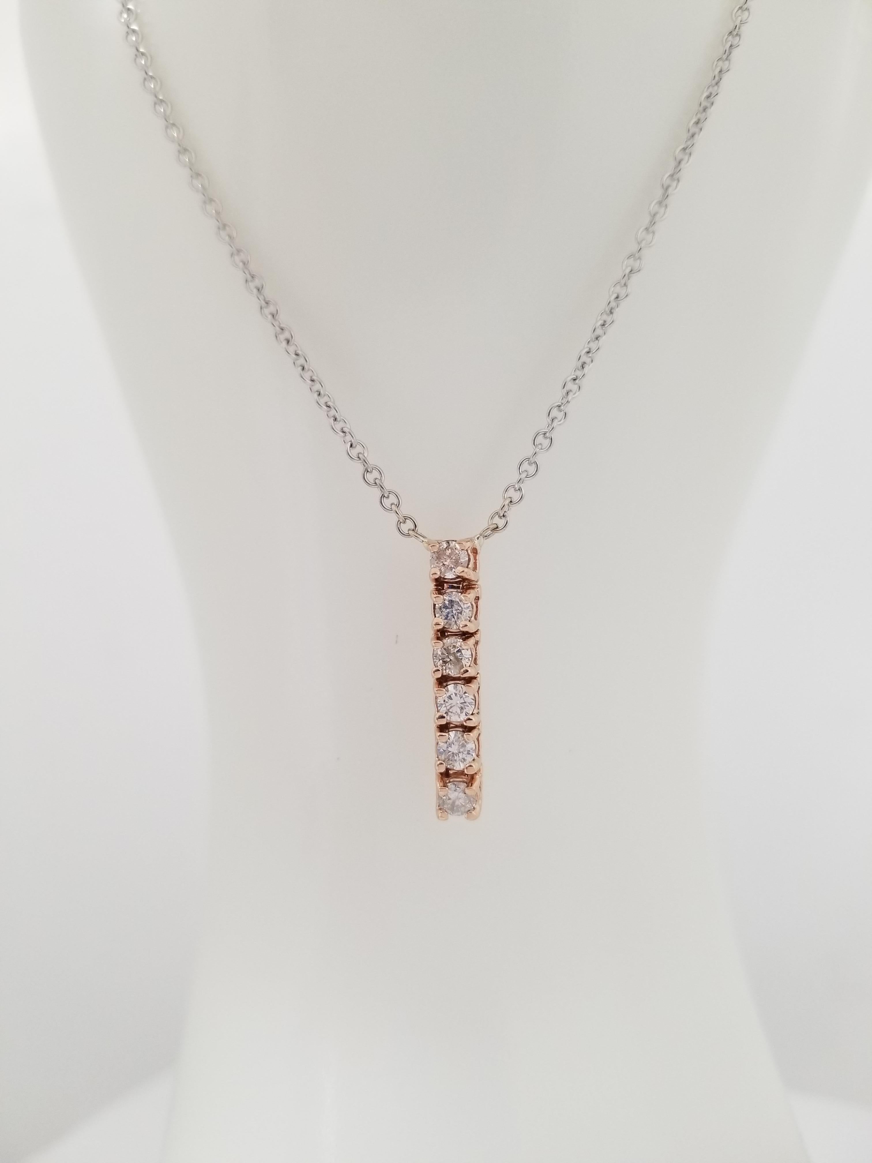 Adorable 0.45 cttw rose gold pendant 14k attached to 16 inch white gold chain, Average Color I, Clarity SI, All natural diamonds. Lobster clasp. 
