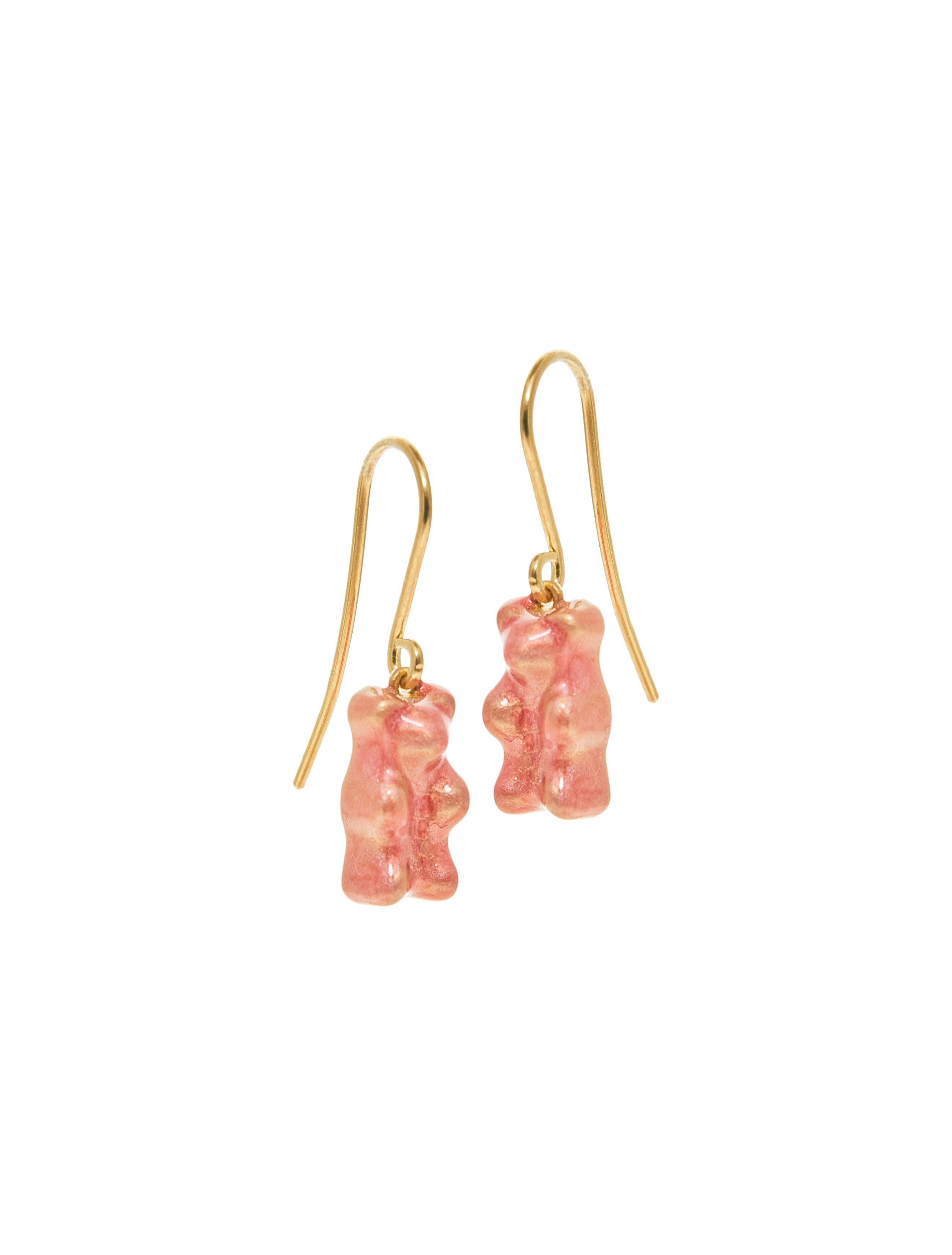 18k Gold plated Silver  gummy bear drop earrings with transparent silver with iridescent pink enamel coverage. 

The Gummy Project by Maggoosh is a capsule collection inspired by the designer's life in New York City and her passion for breakdancing