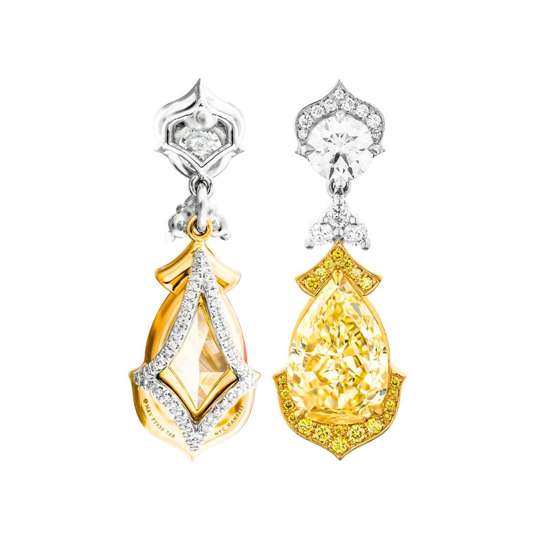 Drop earrings in Platinum & 18K Yellow Gold
Stones:
                  5.27ct Pear Shape Fancy Light Yellow VS2 
                  GIA#7318048698 
                  5.27ct Pear Shape Fancy Light Yellow SI1 
                  GIA#5172457568 
PERFECT