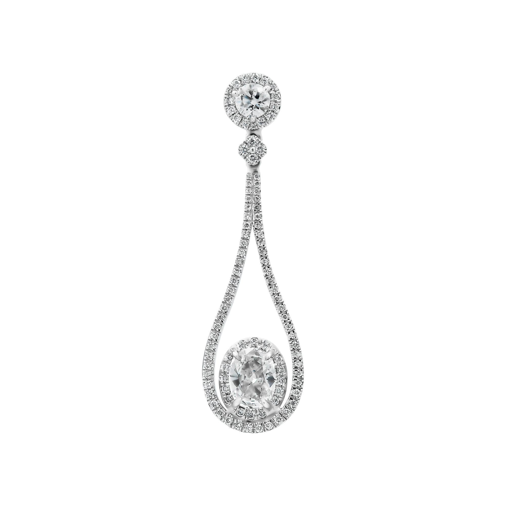 Drop Earrings in 18K White gold with oval diamonds that won't miss a sparkle!
Elegant and timeless, prefect for a wedding, black tie event or if you just a diamond lover like us, you can wear it every day!
Featuring excepcional pave work, Round