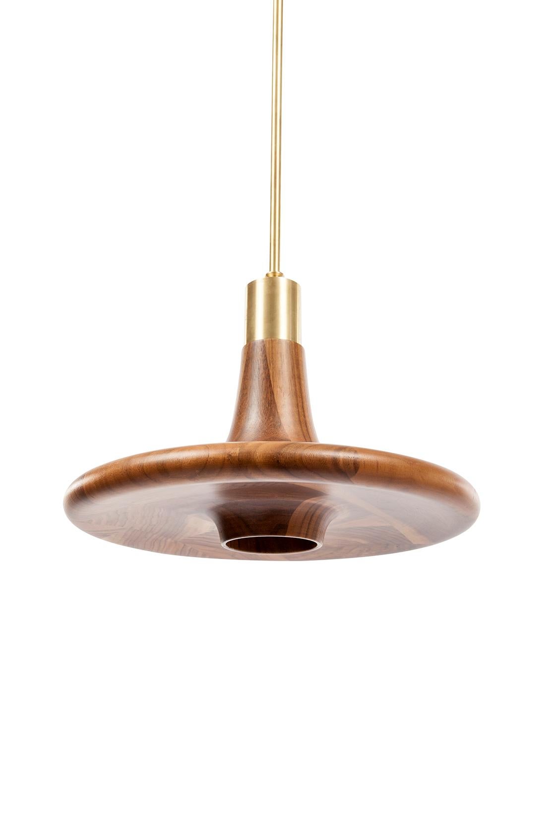 A minimalistic approach for pendant lighting which consists of metal details with a walnut/oak head.
Pendant light. Kitchen, Living room, bedroom.

