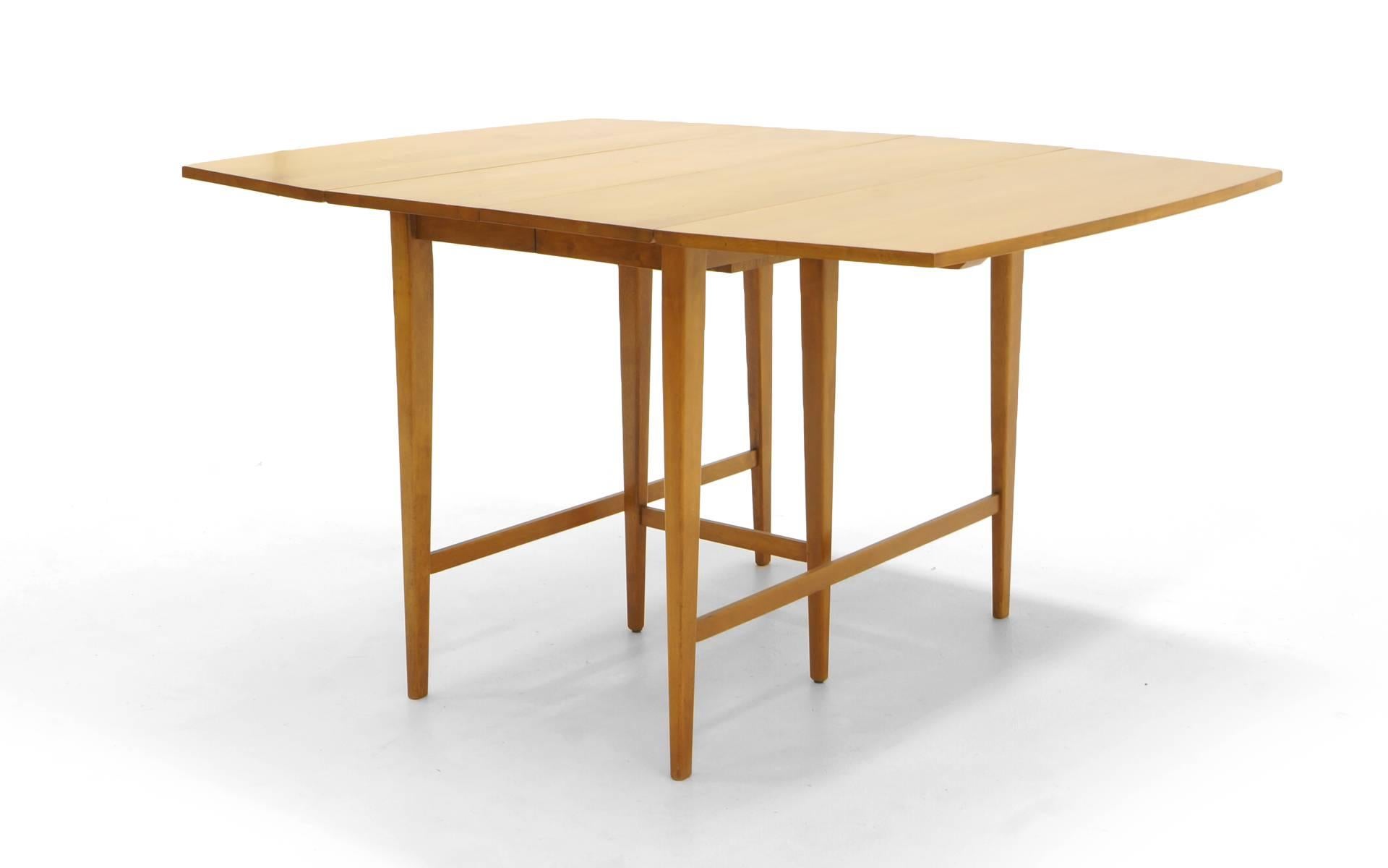 Drop-Leaf Dining Table by Paul McCobb, Expandable with Three Leaves, Solid Maple In Excellent Condition In Kansas City, MO